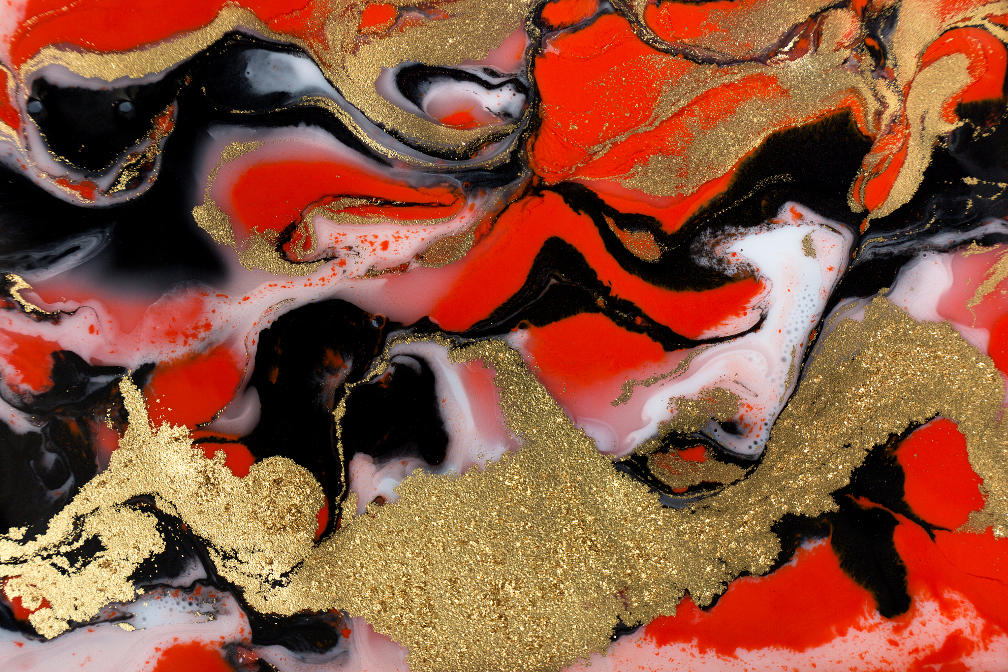 red, black, white and gold paint liquid background. abstract mar