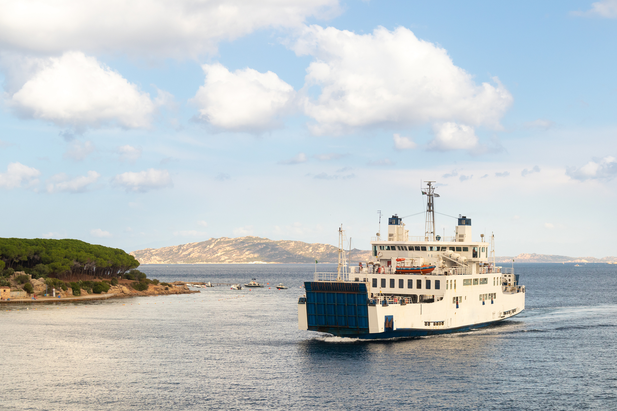 ferry boat ship sailing between palau and la maddalena town, sar