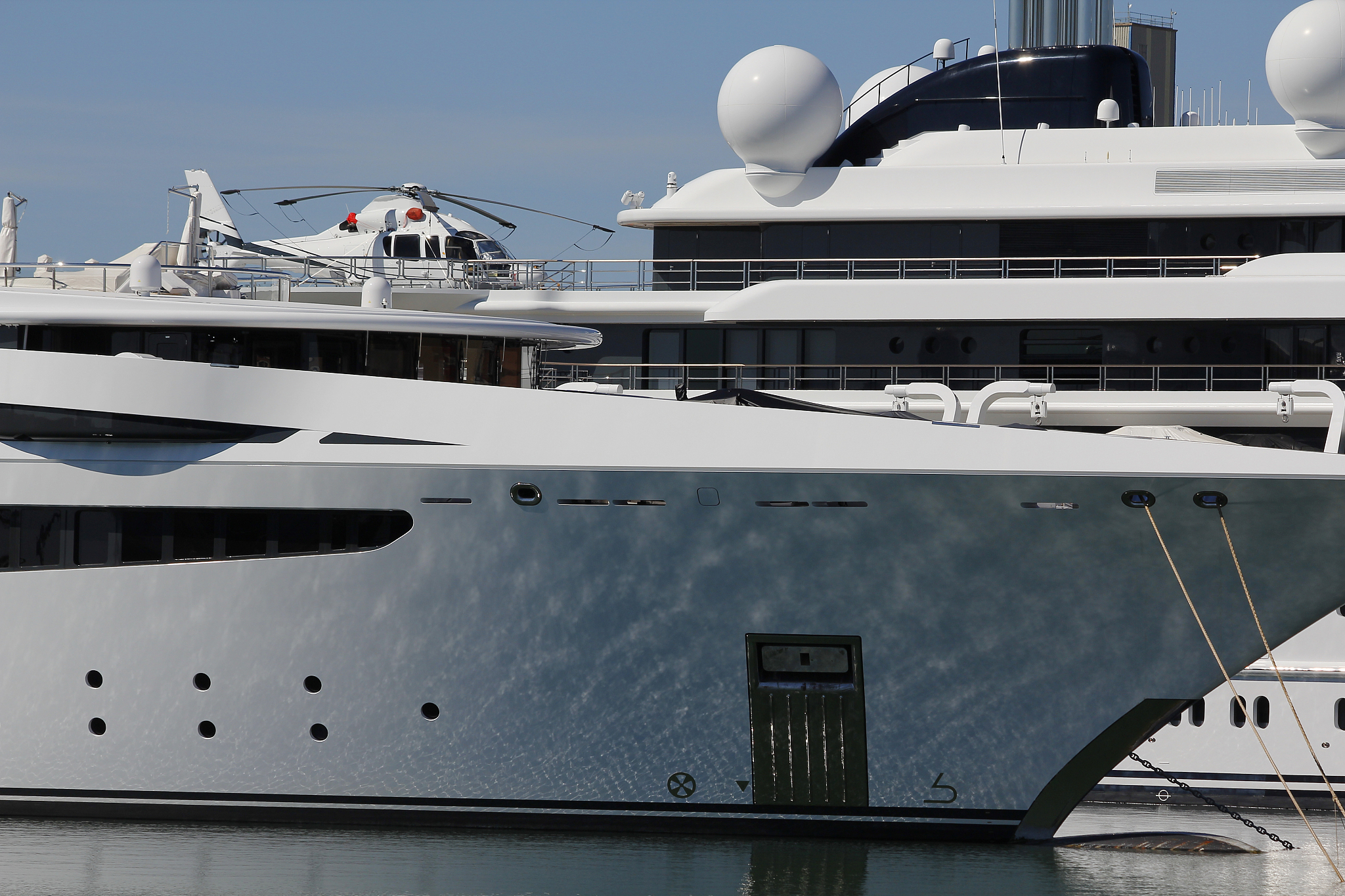 luxury yacht with private helicopter