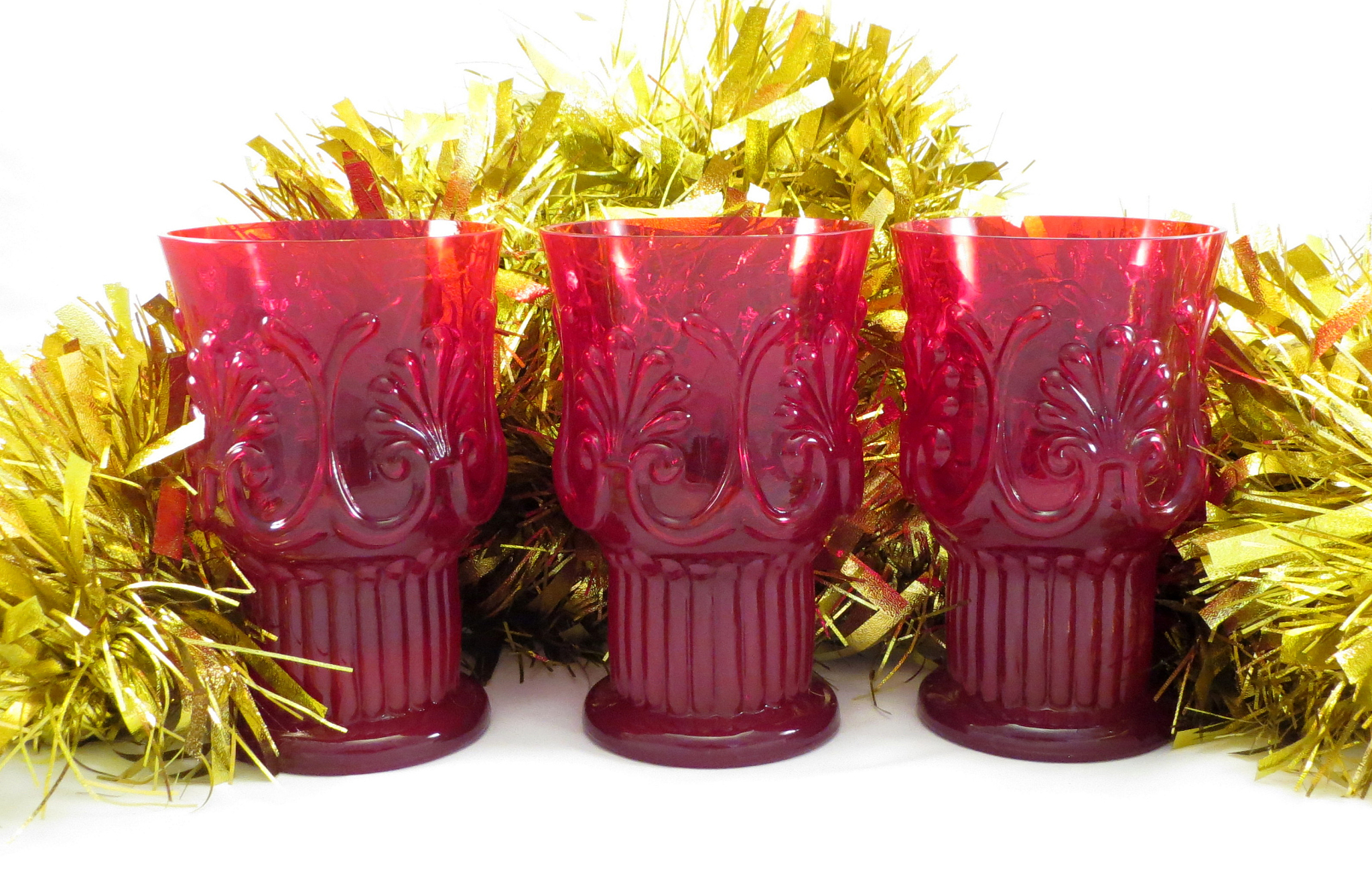 christmas ornament with three red glasses