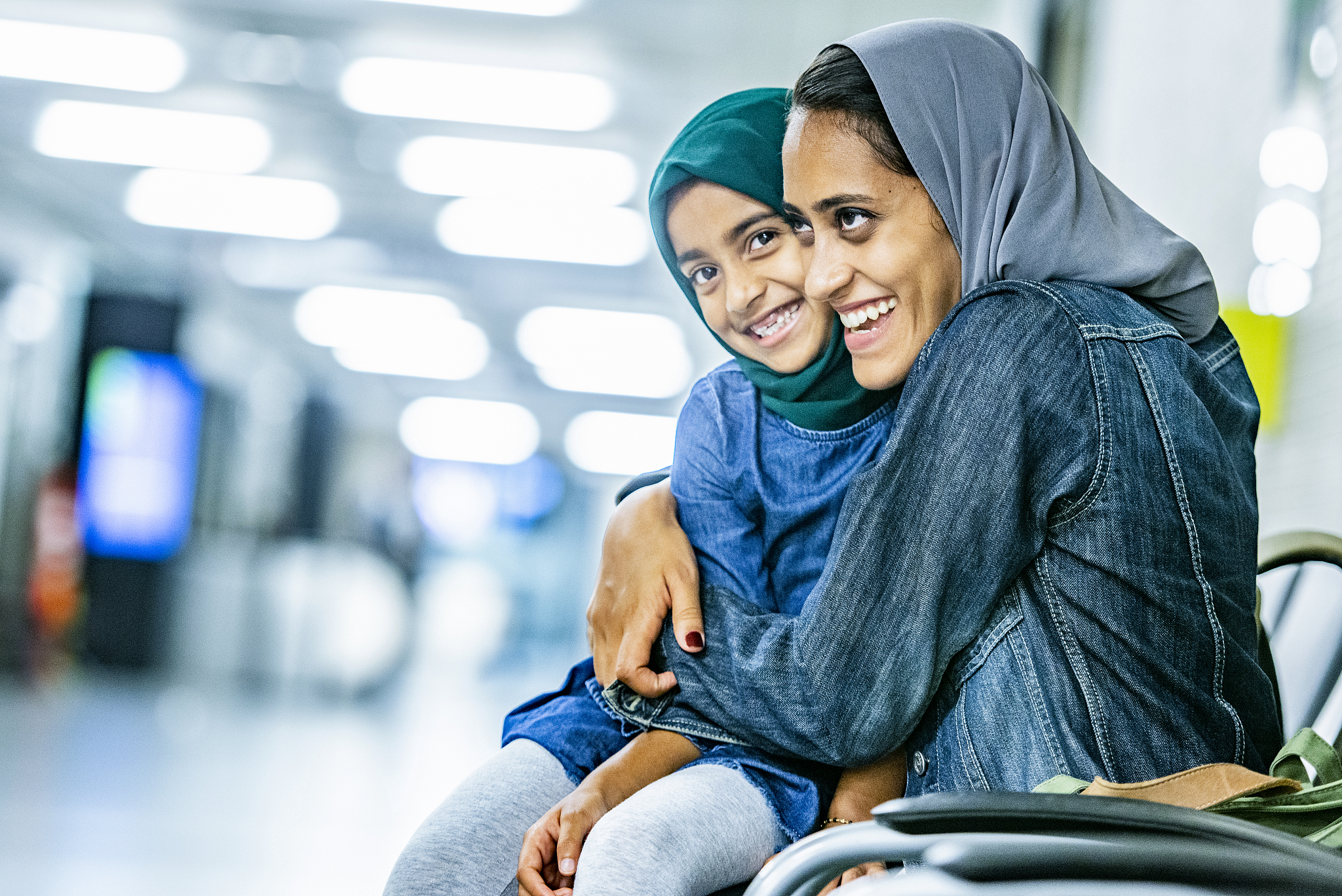 muslim mother and daughter travelling