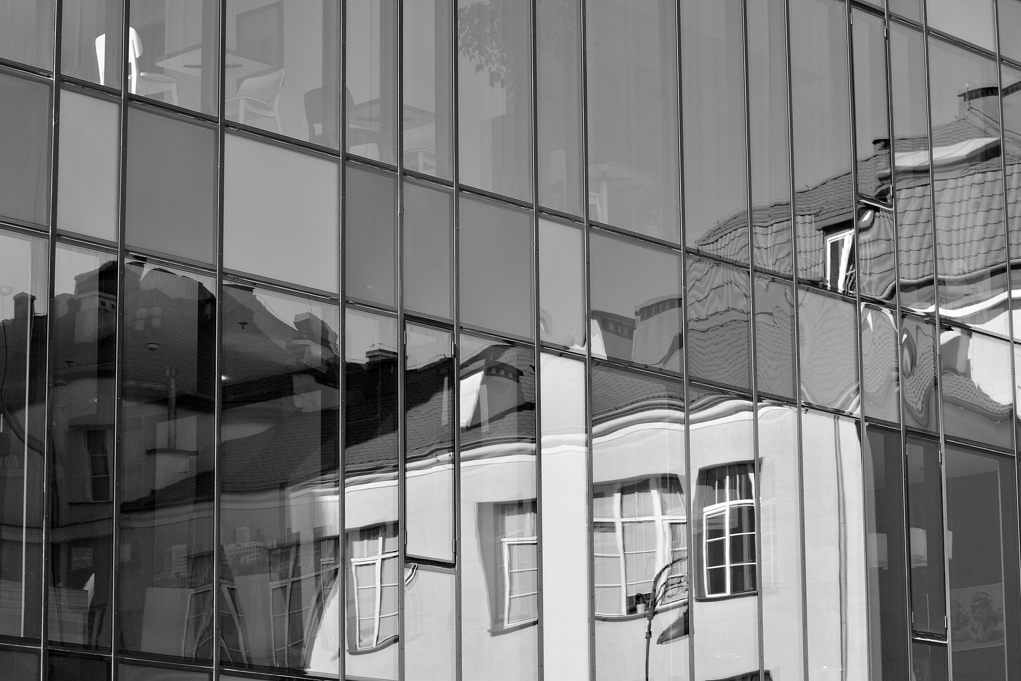 modern office building wall made of steel and glass. black and w