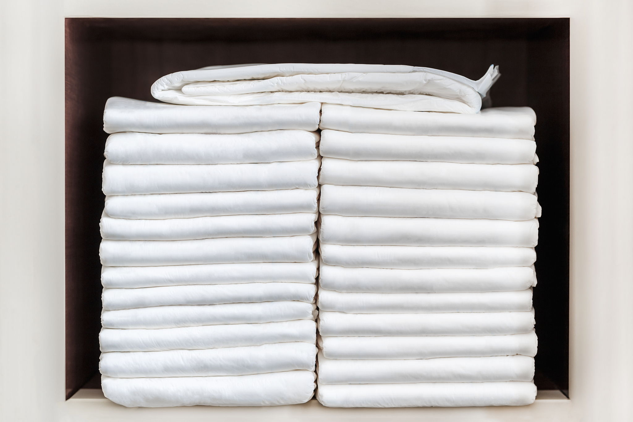stack of adult diapers on the shelf