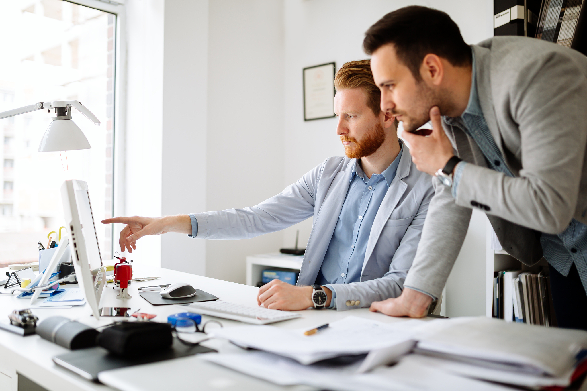 coworkers working on project together