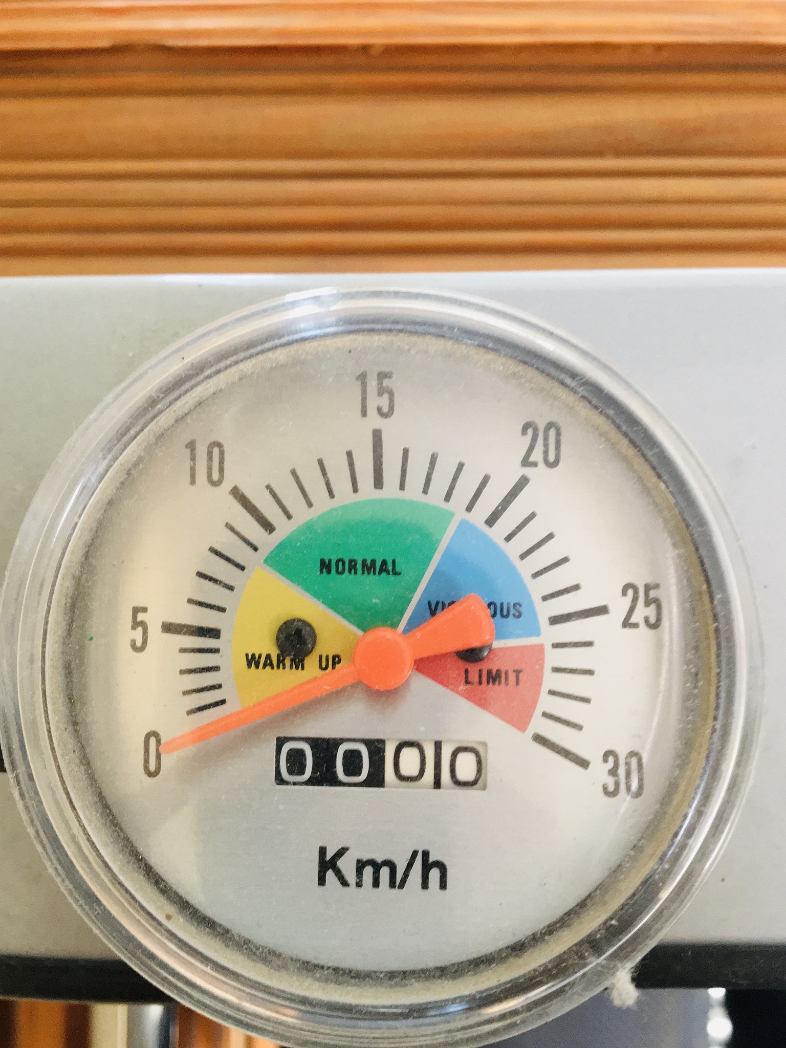 an old and worn speedometer