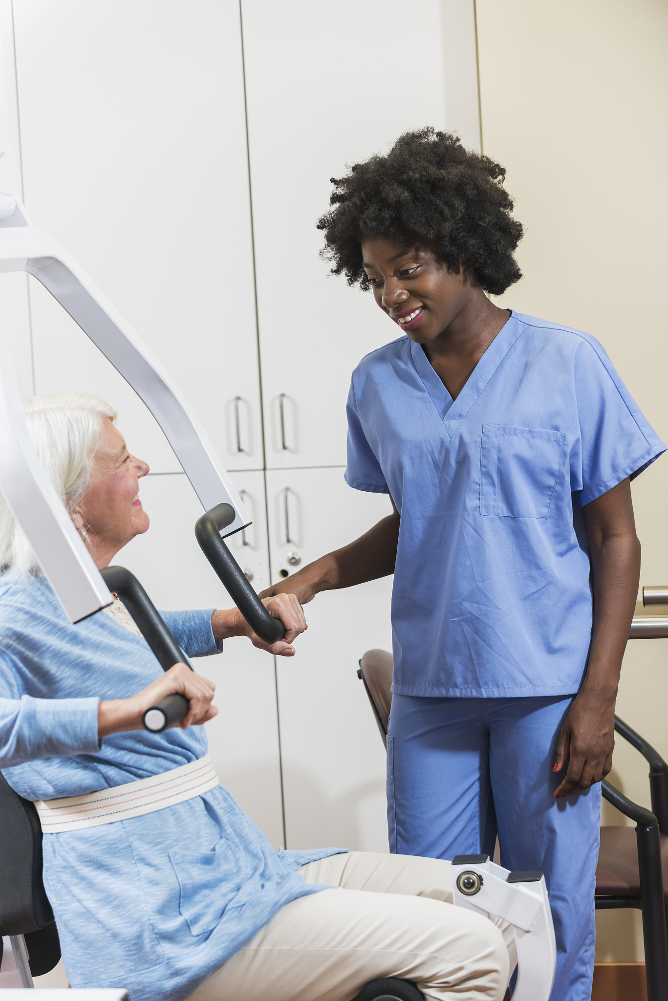 physical therapist working with a female patient