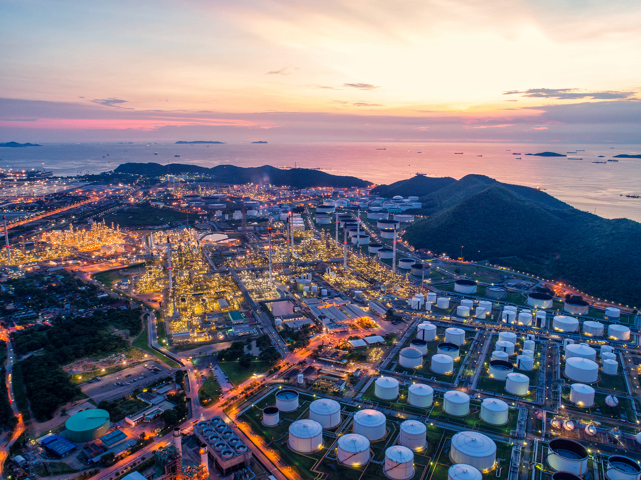 industrial view at oil refinery plant form industry zone with su