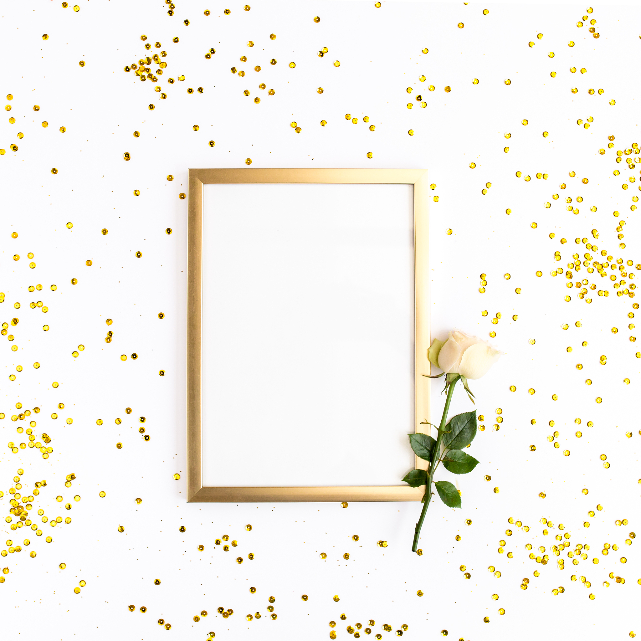 photo frame mock up with space for text, golden confetti on whit