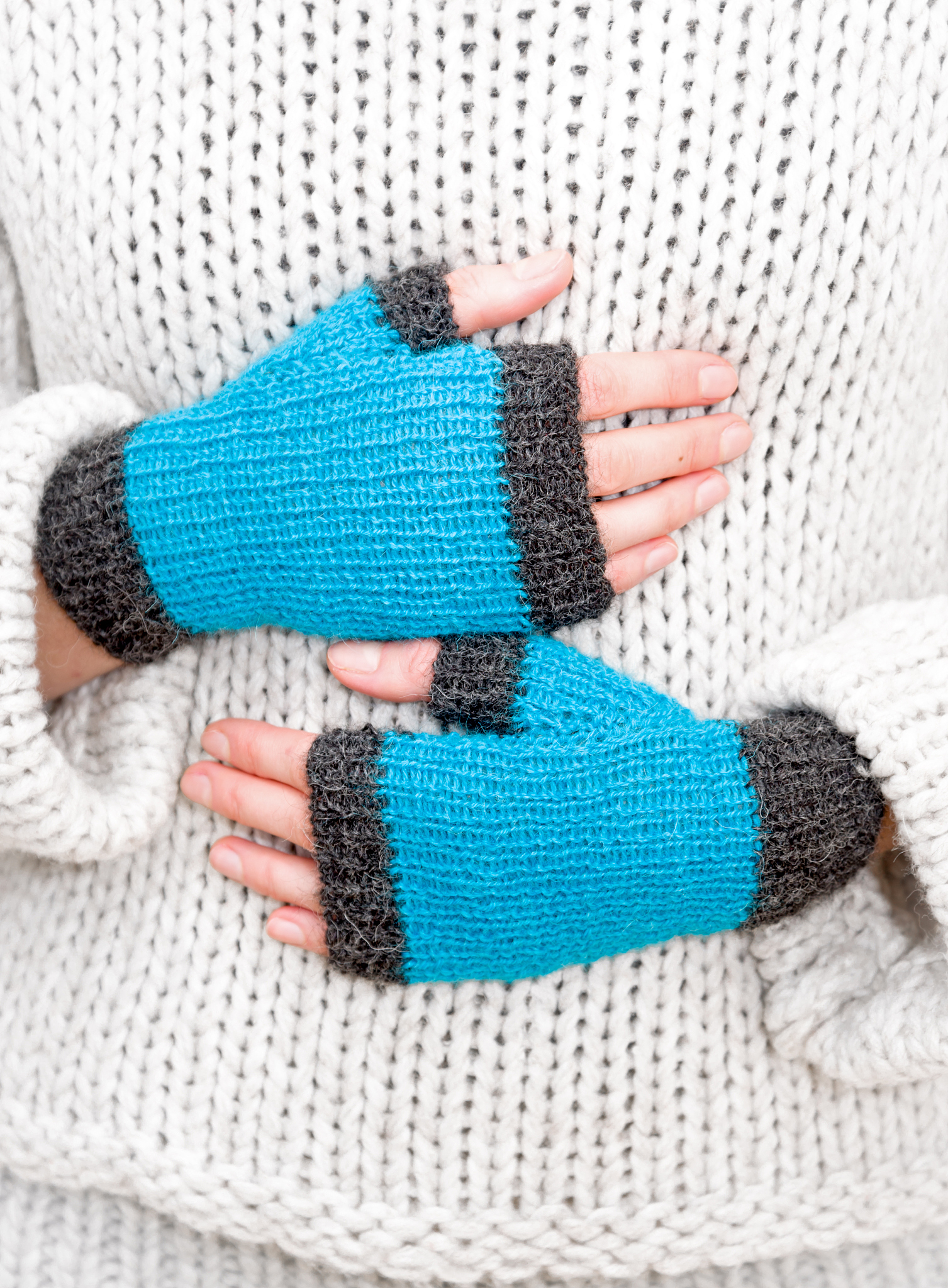 female hands in mittens
