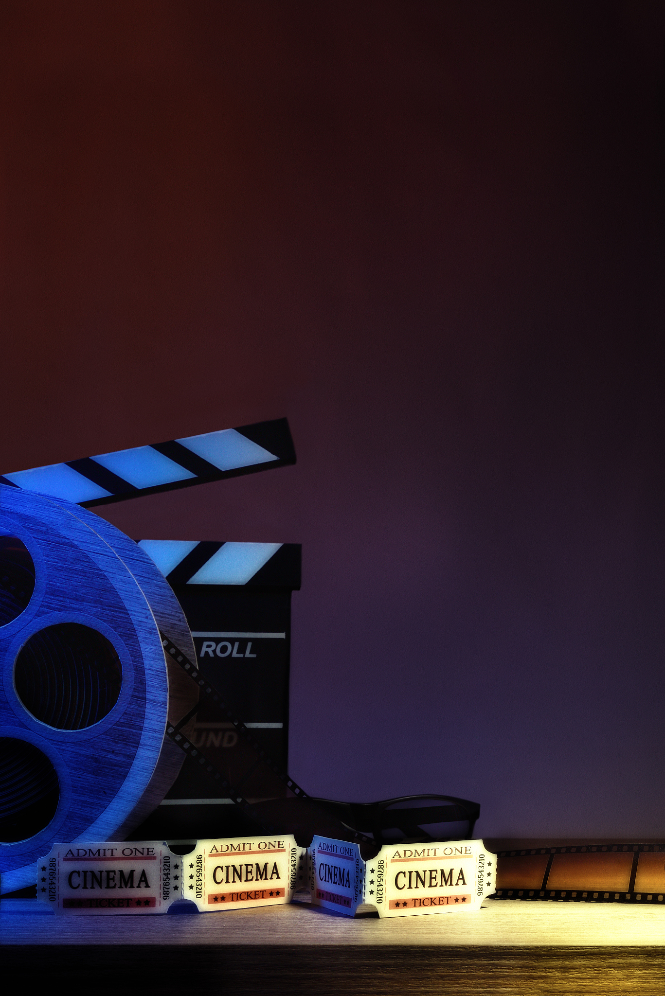 equipment and elements of cinema with dark blue background verti