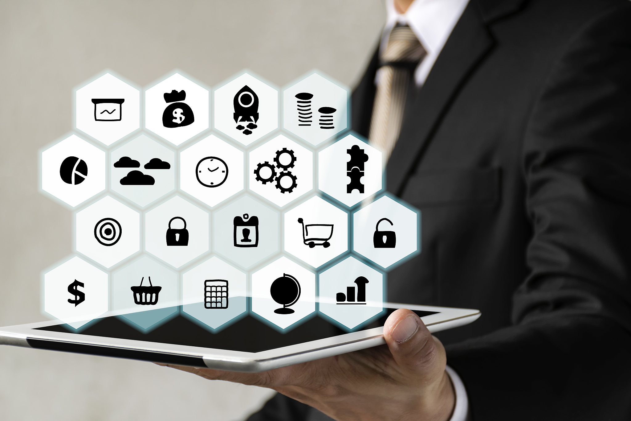 businessmen hold tablets, business symbols placed on the honeyco