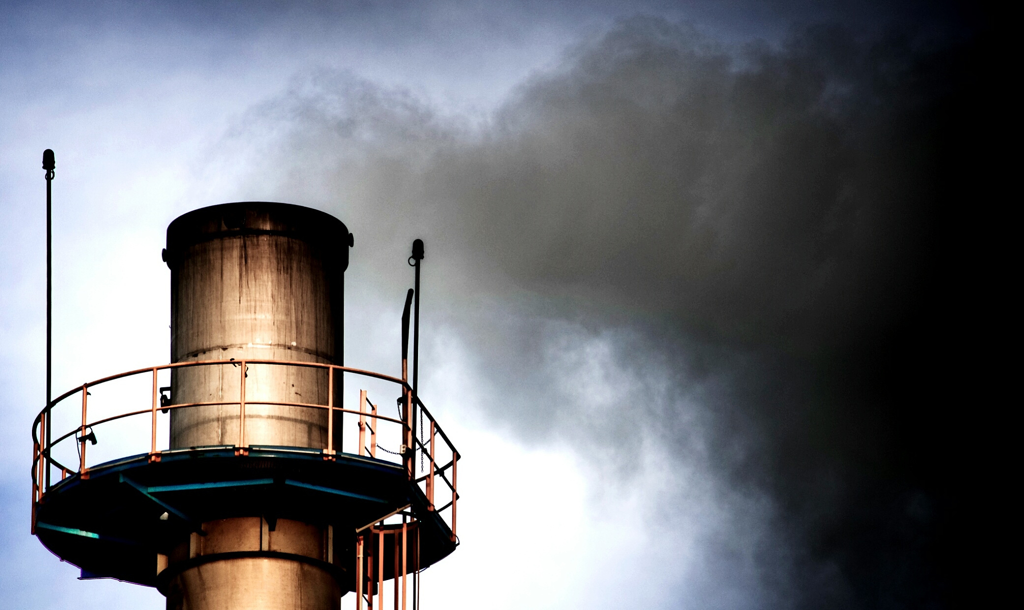 smoke stack against sky