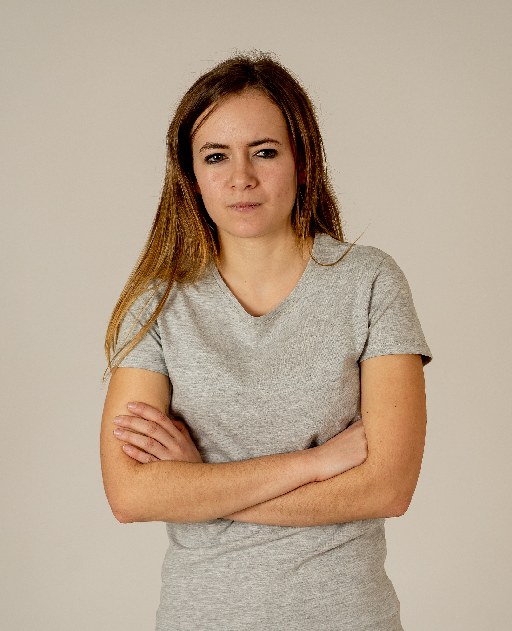 portrait of young pretty caucasian teenager with angry face look