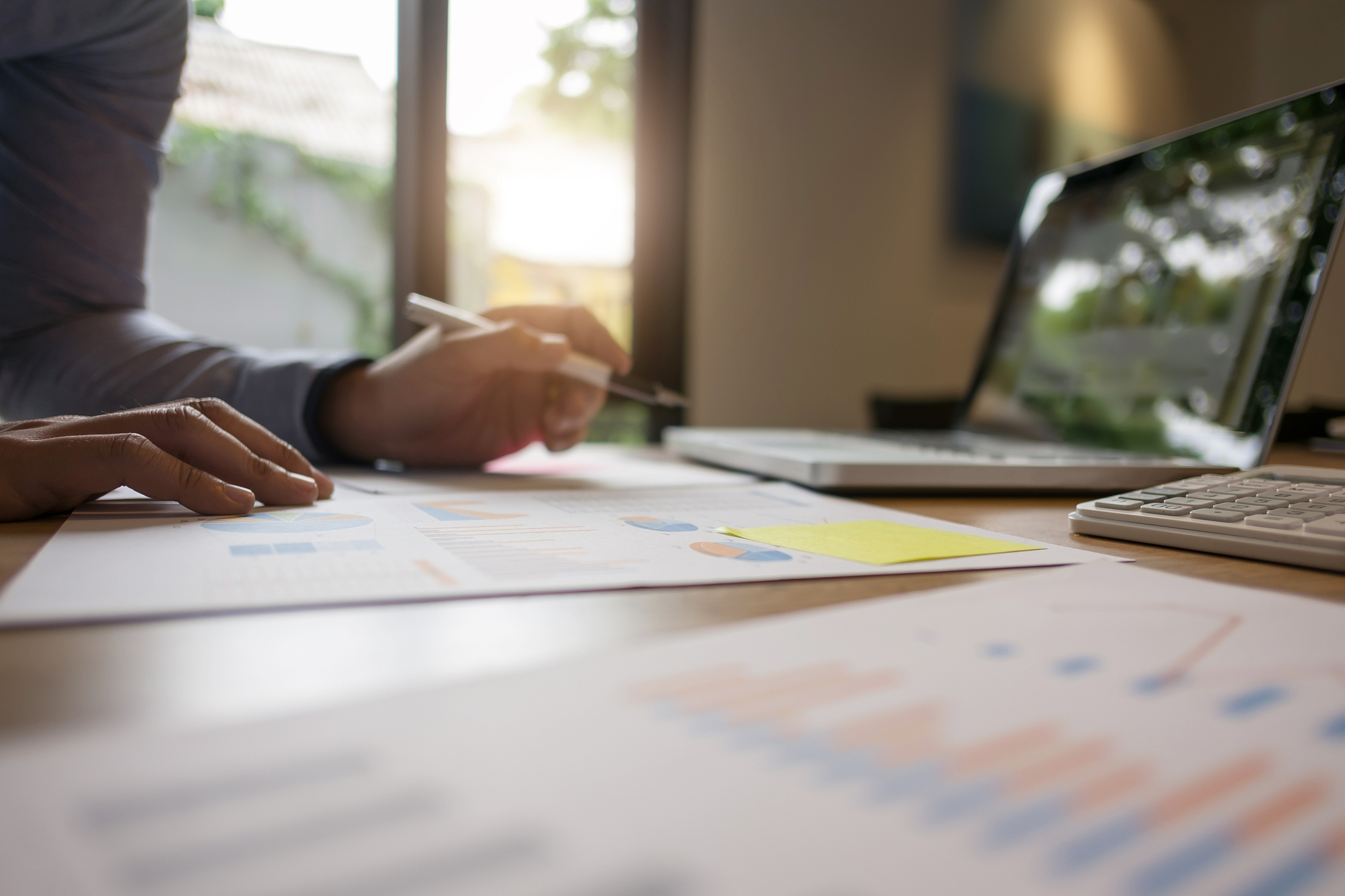 businessman working on report documents at home