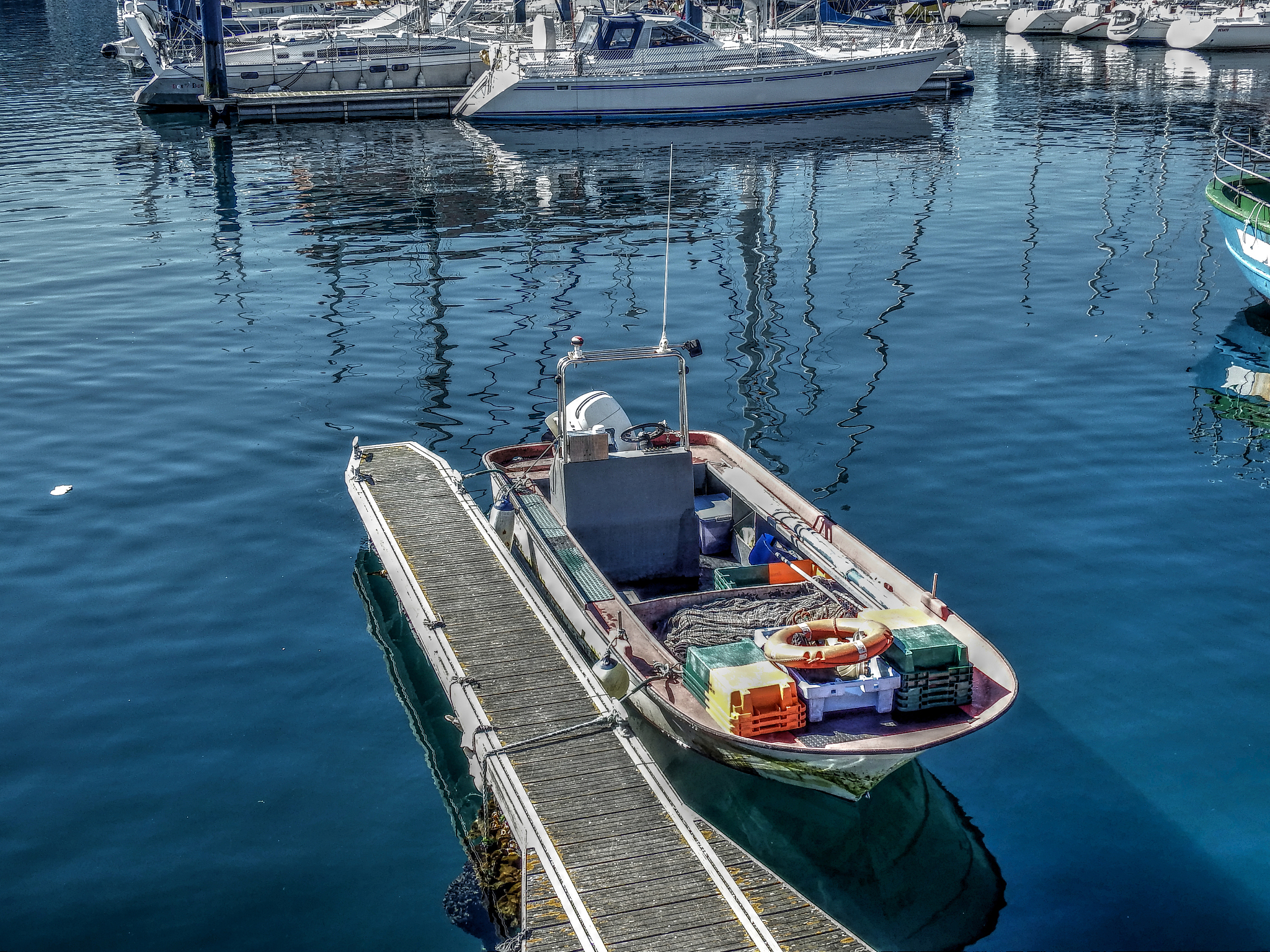 Ship Deck and Hull Oil Pollution Clean-up in Progress - Preventing Sea Contamination