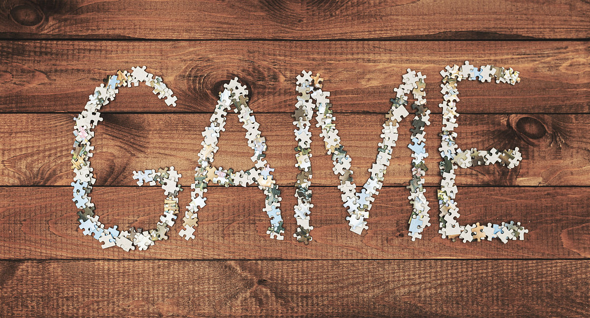 猜字谜起源帮我用210字详细描述