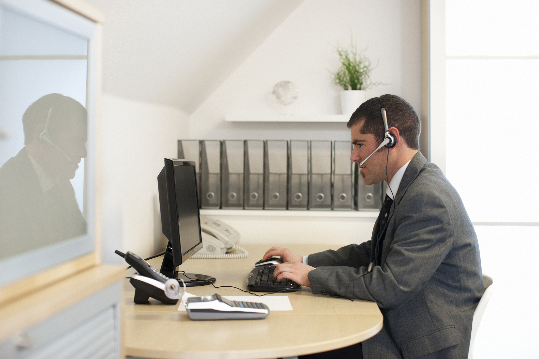 business man in front of computer