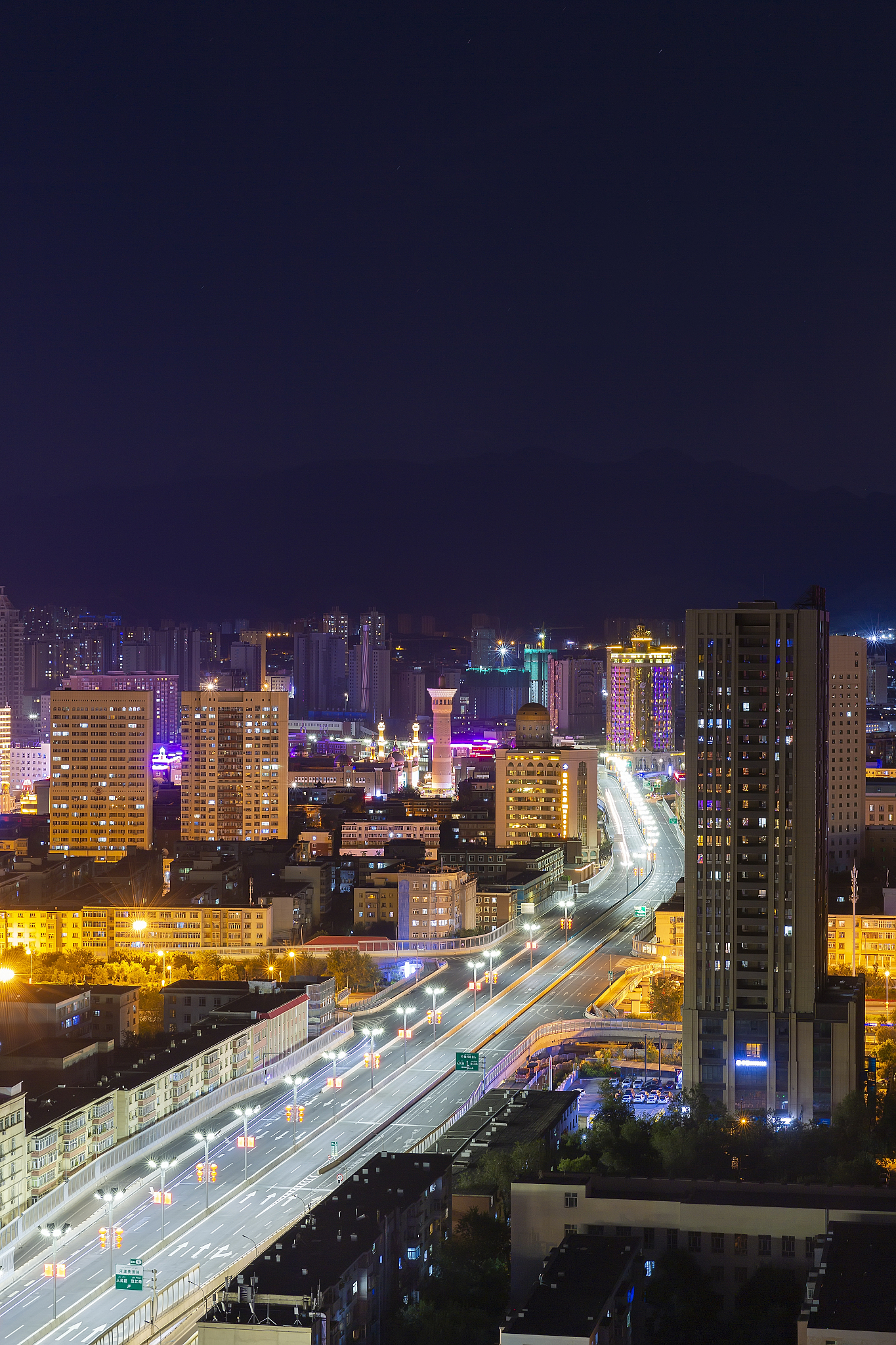 乌鲁木齐城市夜景道路无车大巴扎及外环路居民楼