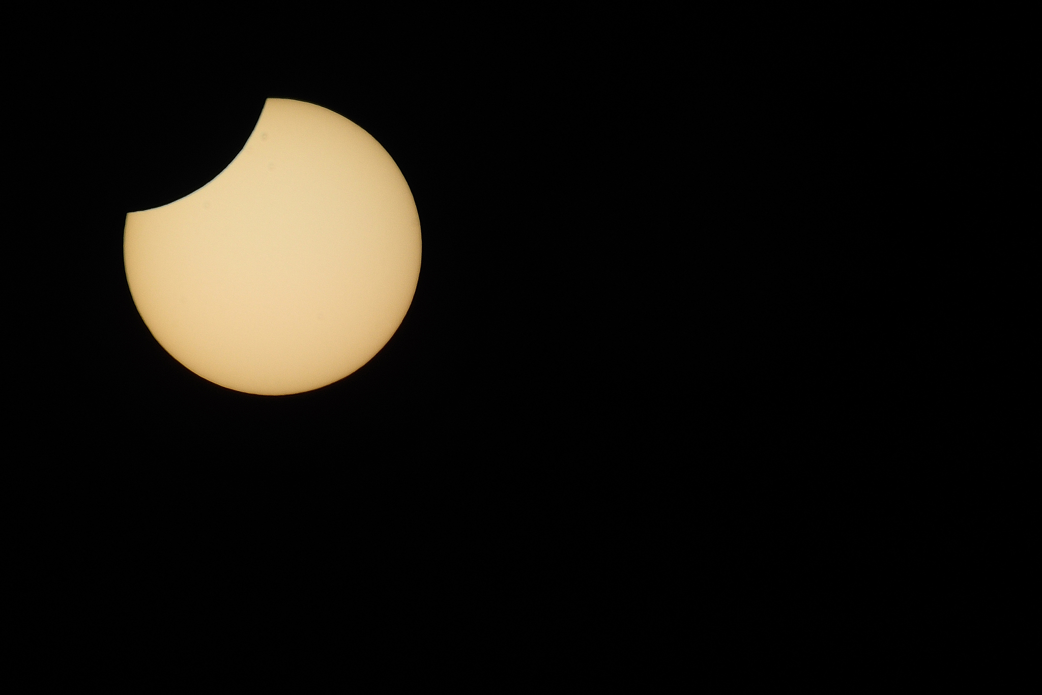solar eclipse with moon emerges