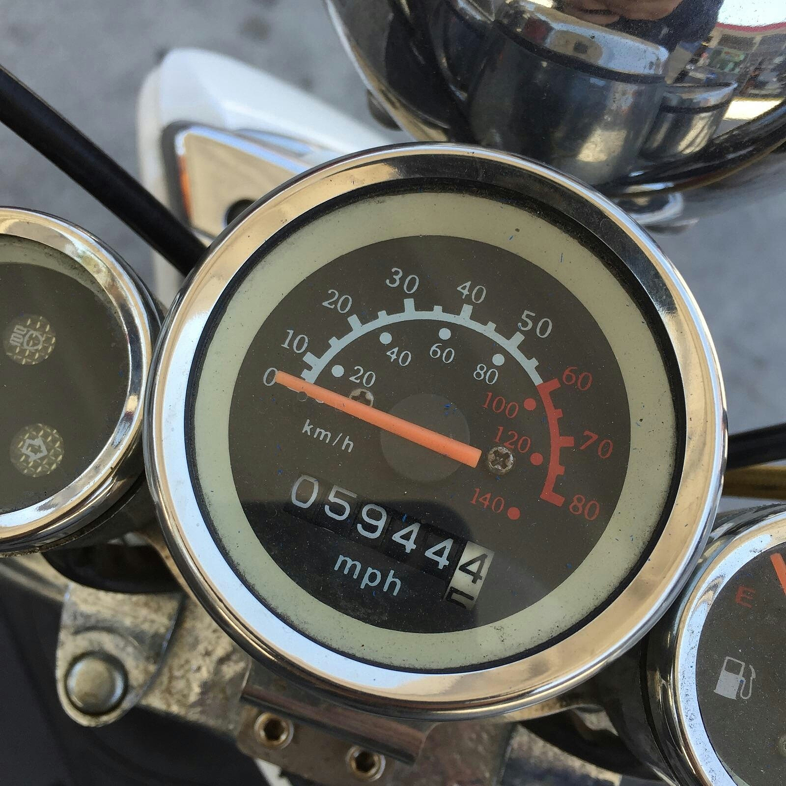 close-up of motorcycle speedometer