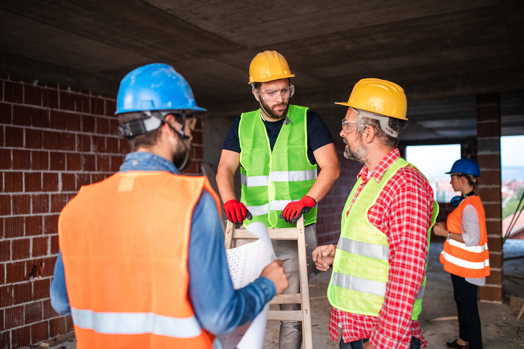 construction workers during apartment construction