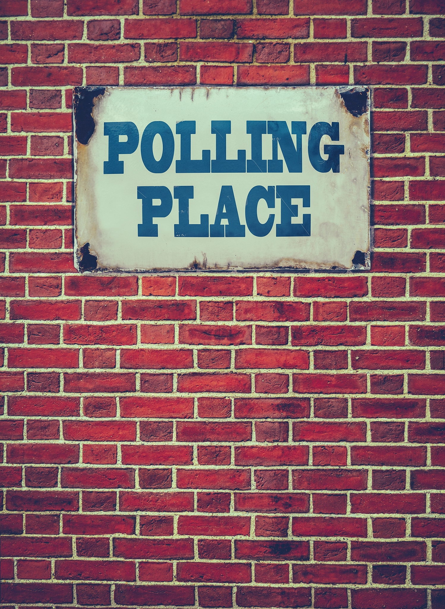 polling place sign on wall