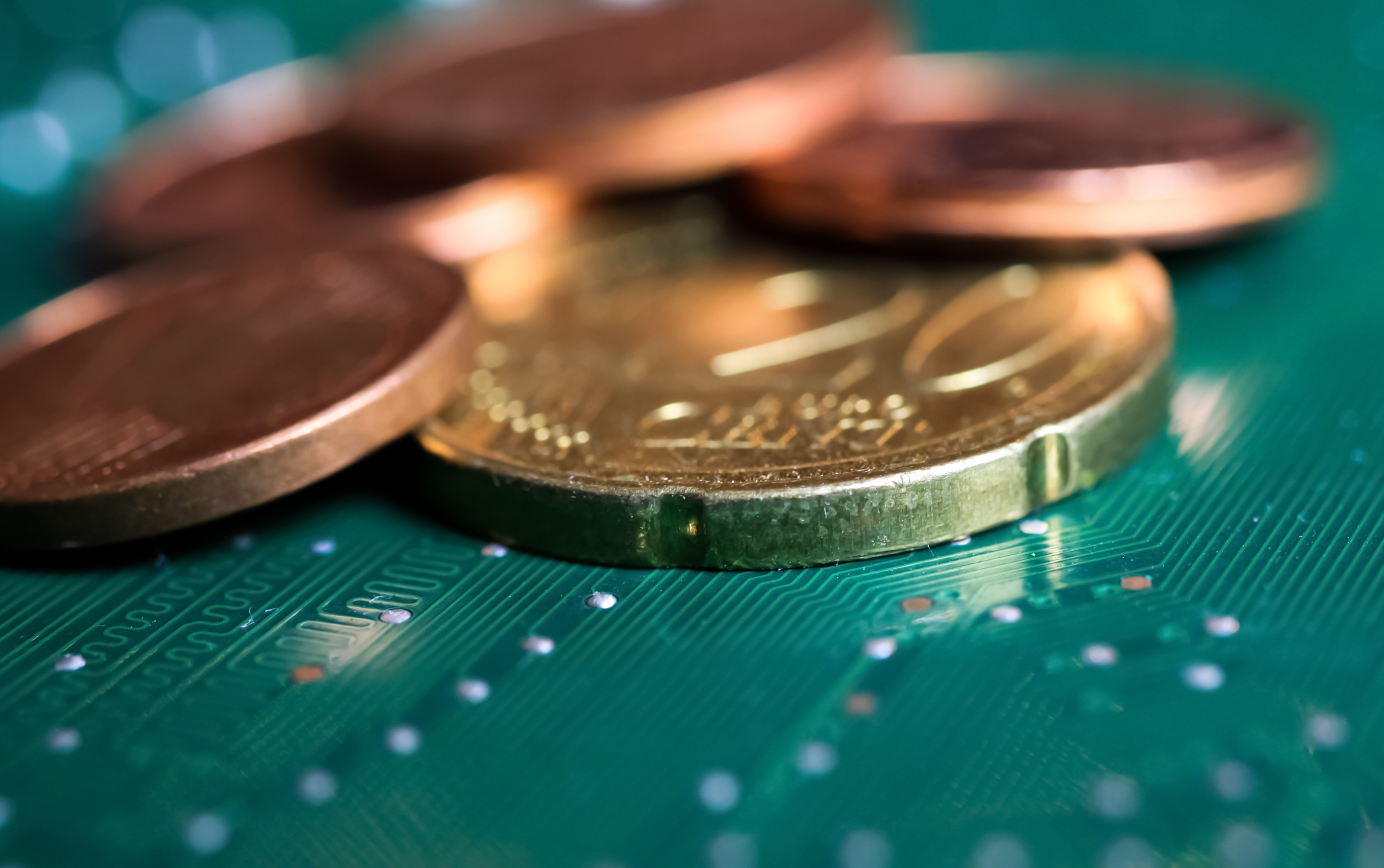 makro close up of isolated blurred pile euro cent coins on green