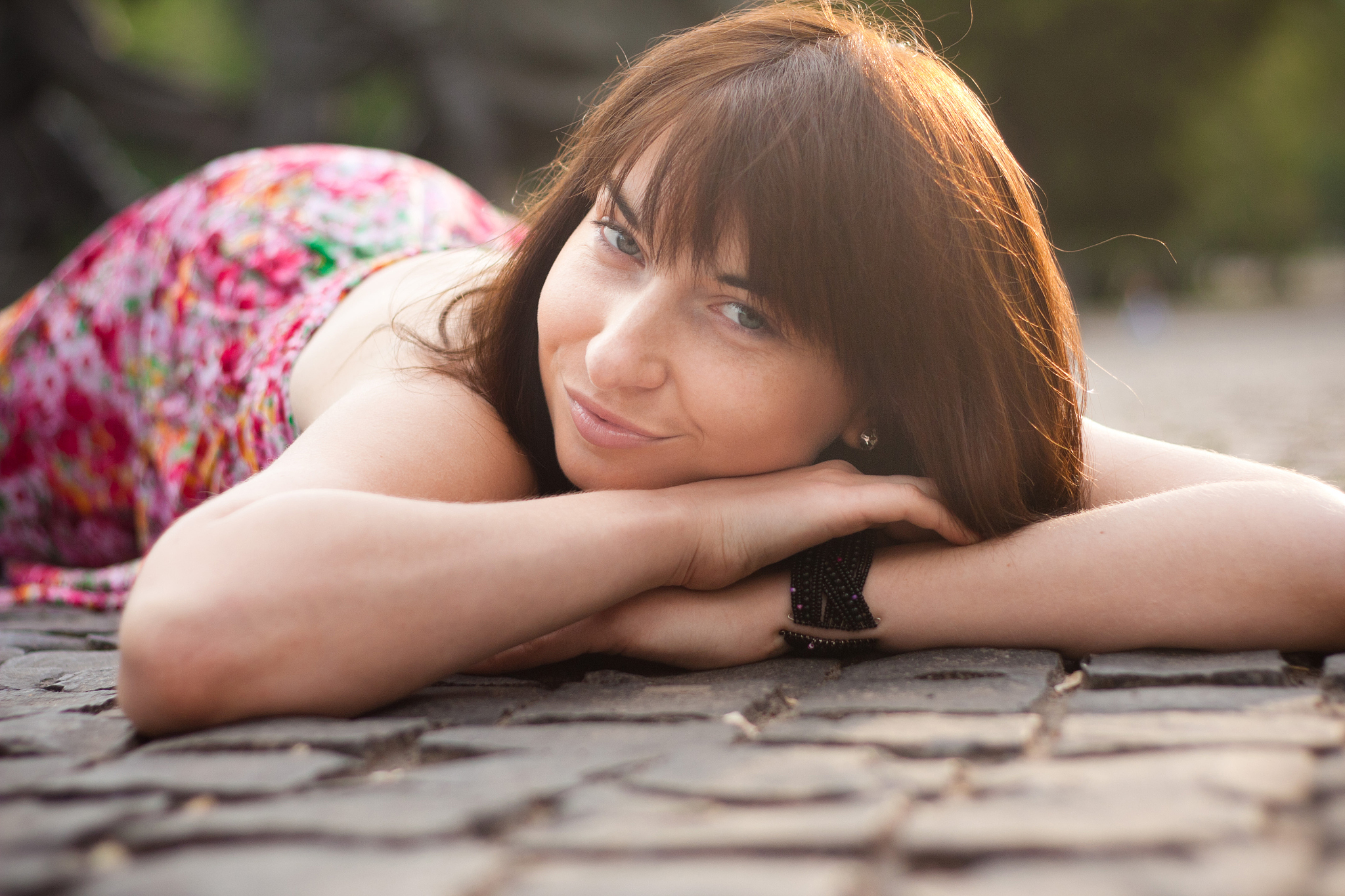 woman lies on the road