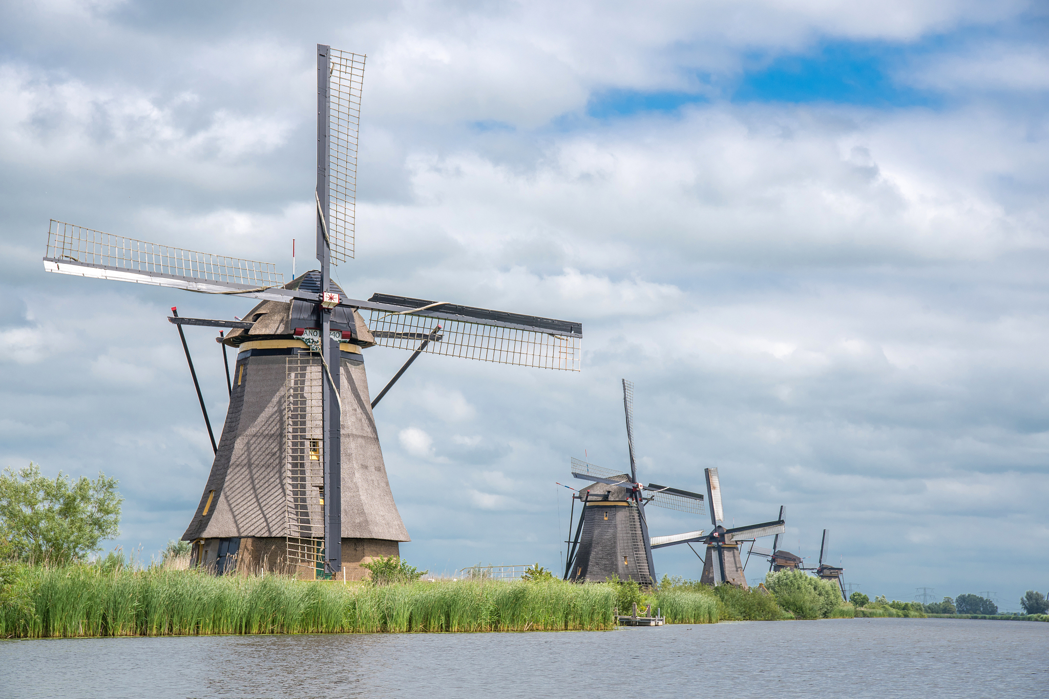 row of windmills in holland