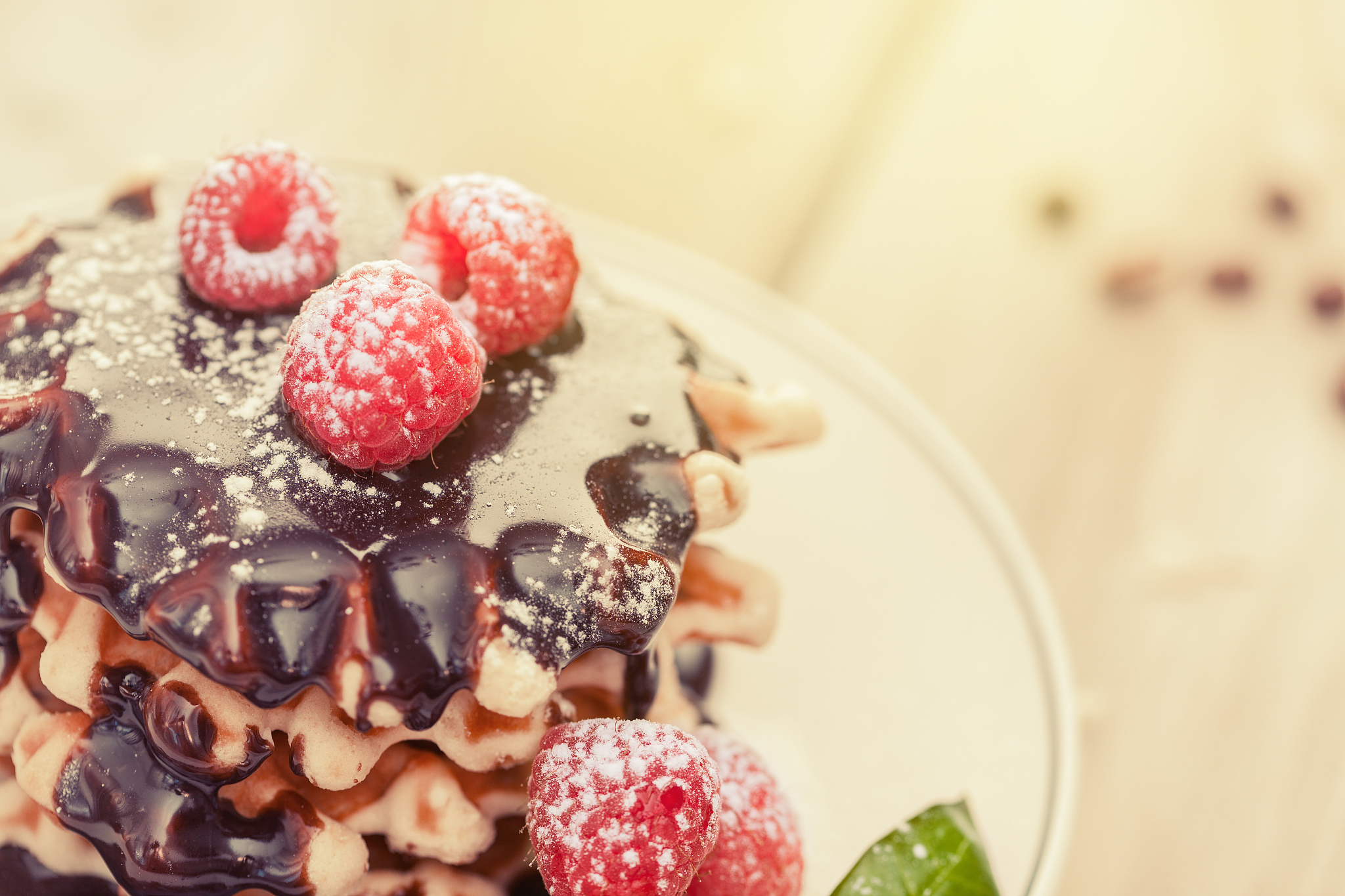 waffles with raspberry and chocolate sauce