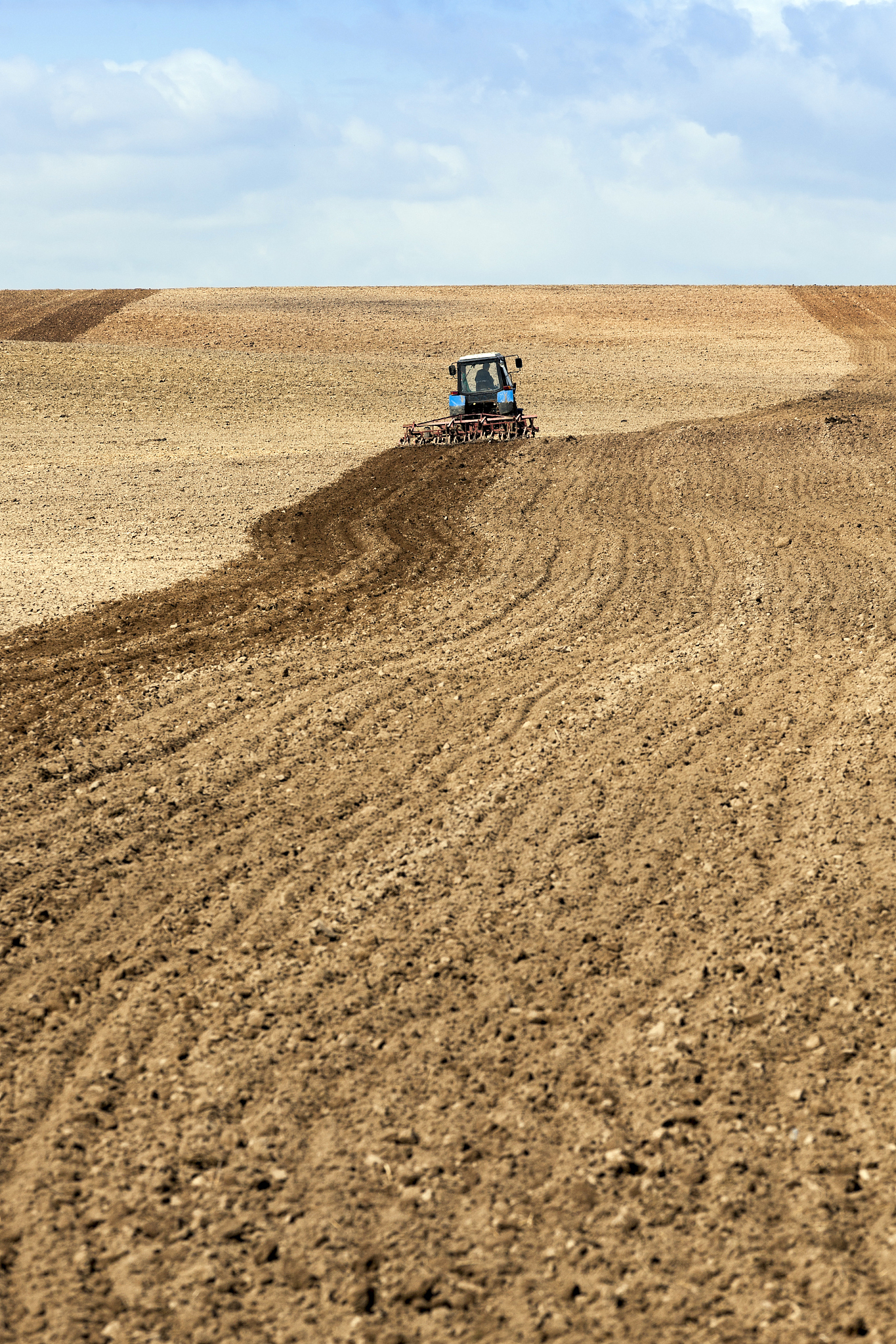 tractor plowing field