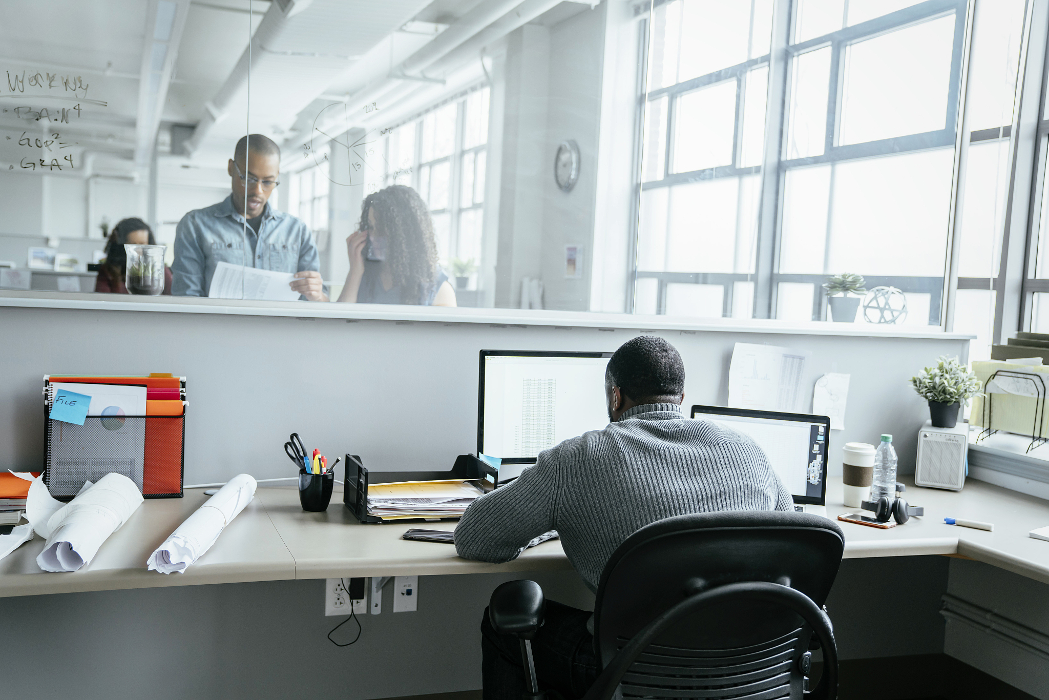 man using computer in office