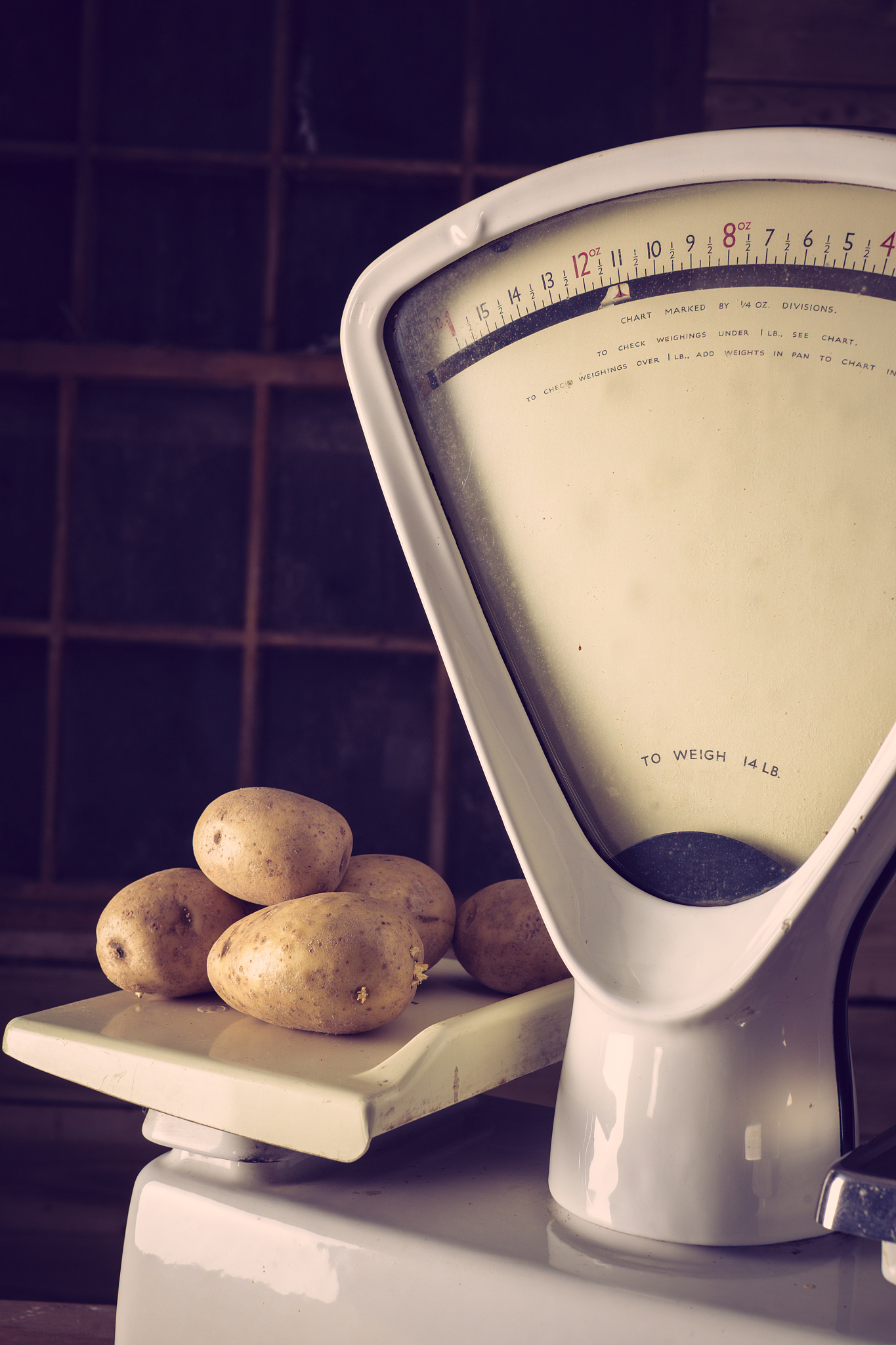 weighing potatoes on vintage scales