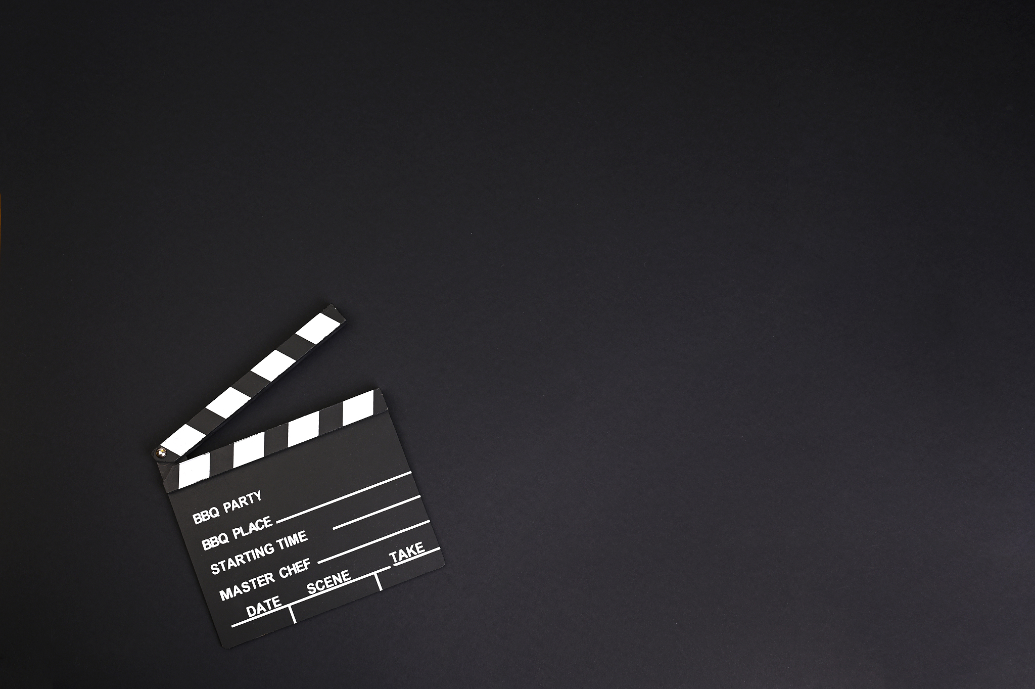 clapper board or movie slate.it is used in video production and 