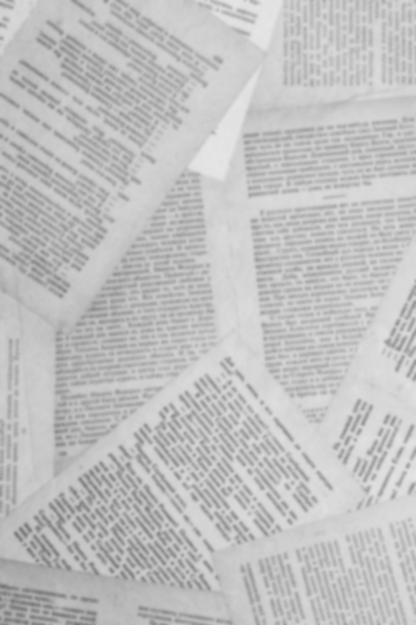 old pages of the book are spread out and pasted over