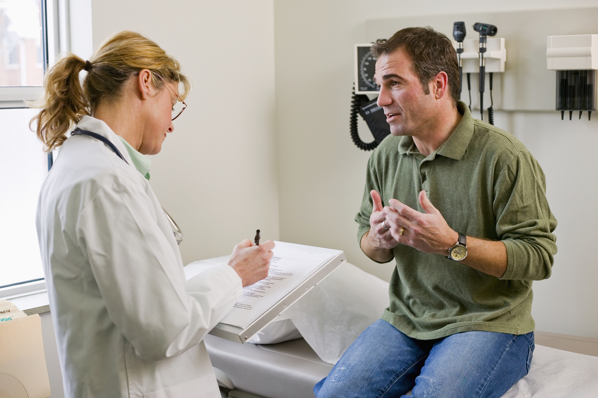 patient talking to doctor