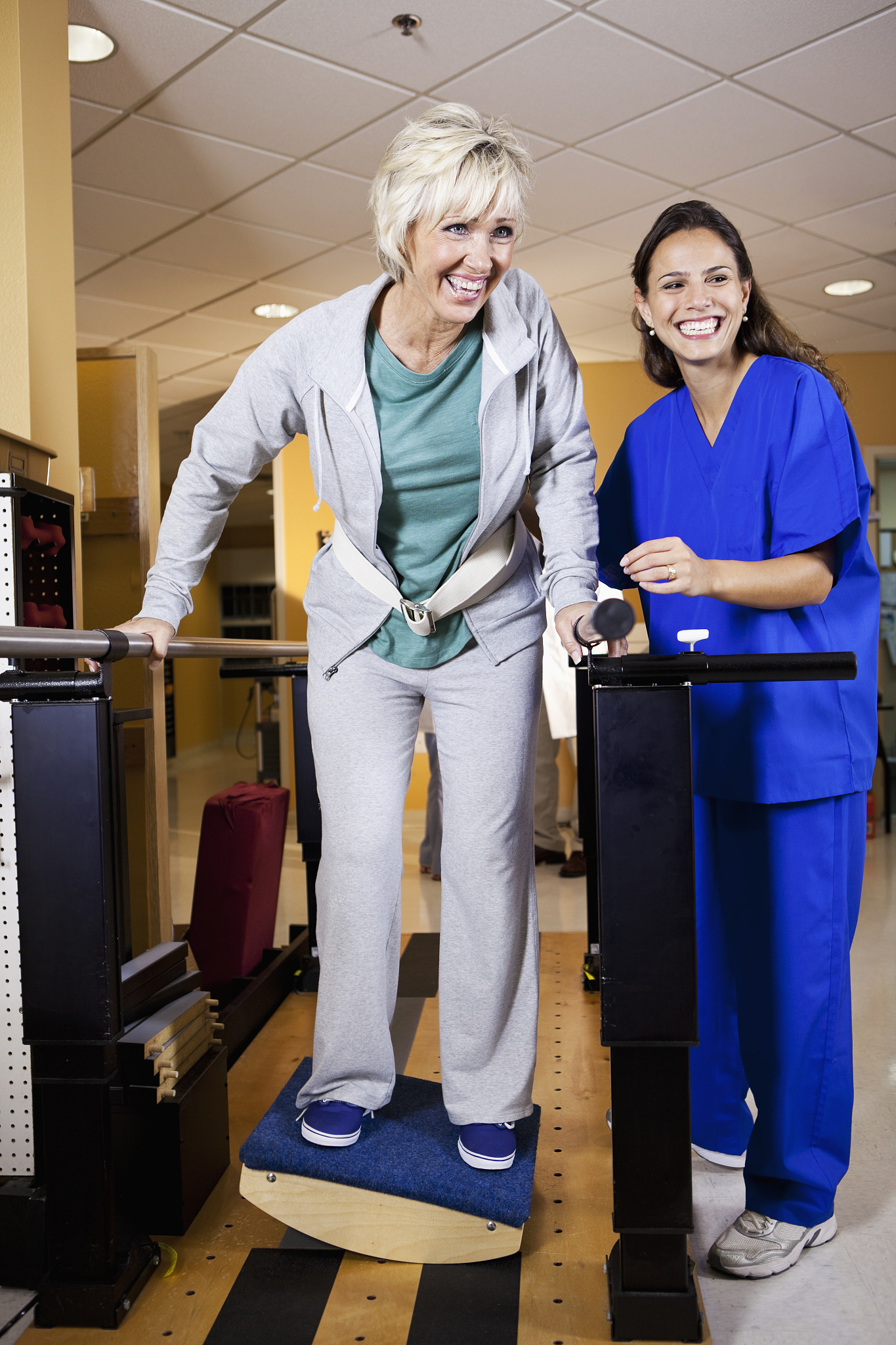 physical therapist working with patient