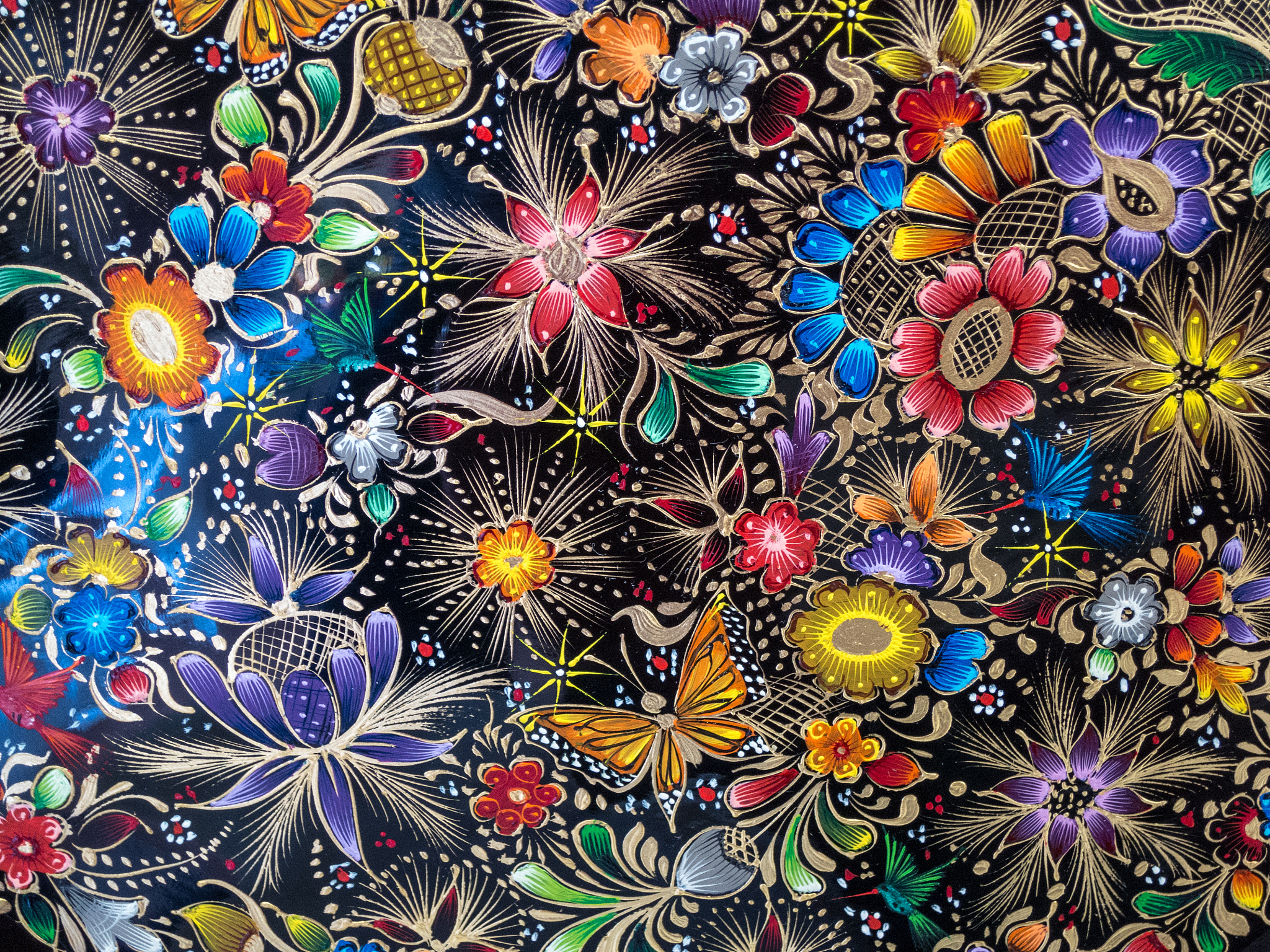 detail of lacquer painting on wood, mexico