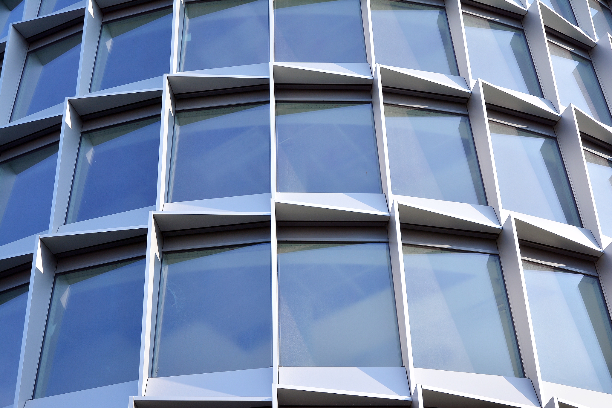 abstract reflection of modern city glass facades.
