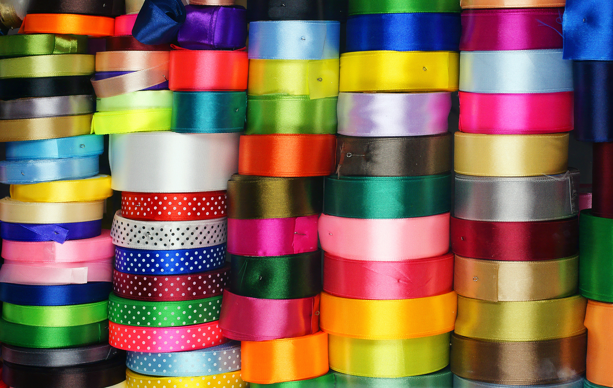 variety of satin ribbons in different colors and lengths