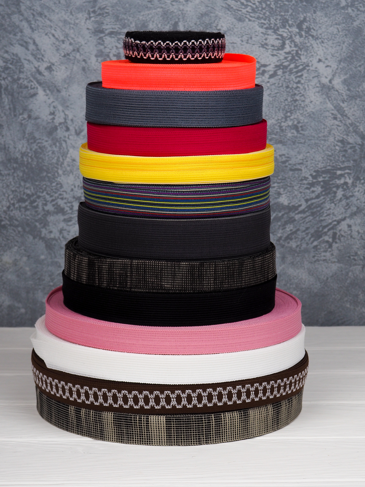 ribbon of different colors in coils, many multi-colored coils fo