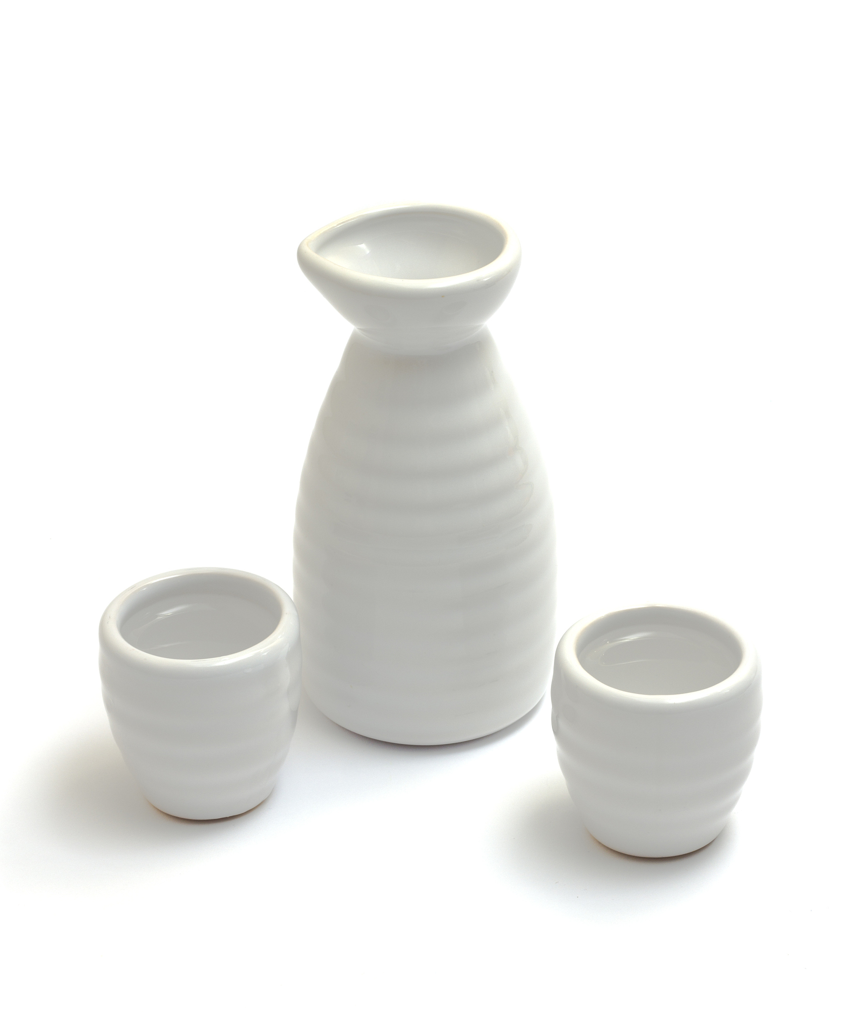 japanese traditional sake cups and bottle isolated