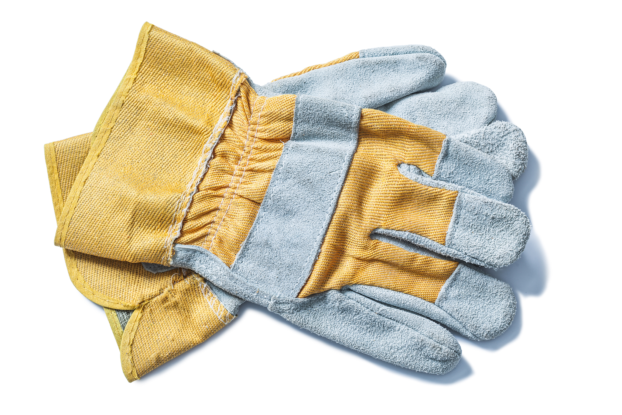 construction safety leather gloves isolated on white