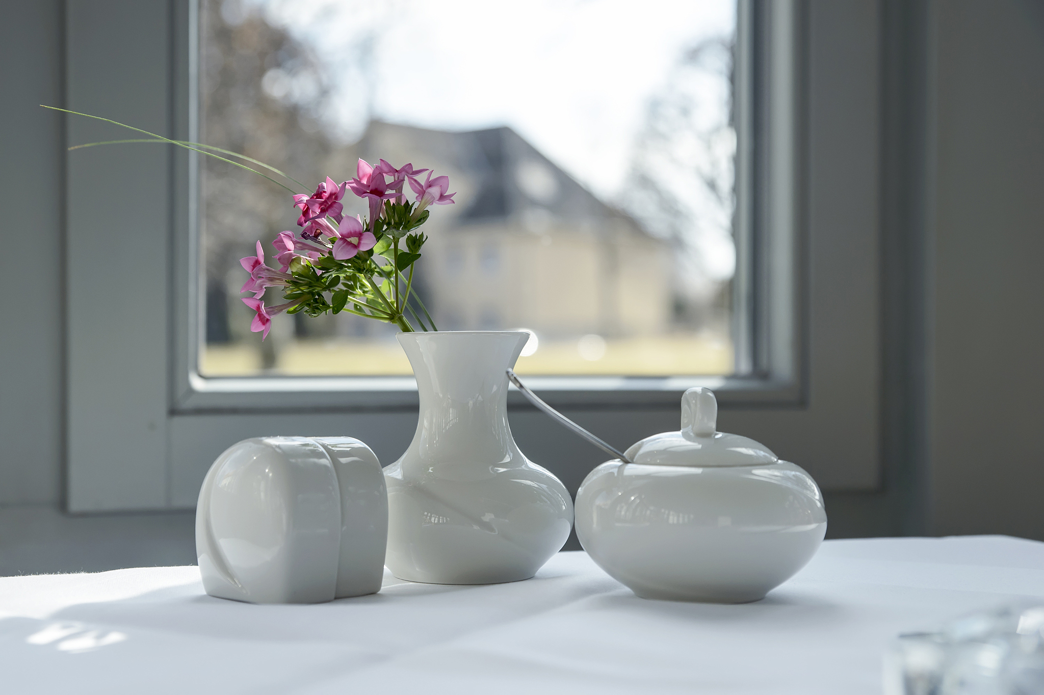 morning table setting for breakfast from white tableware by the 