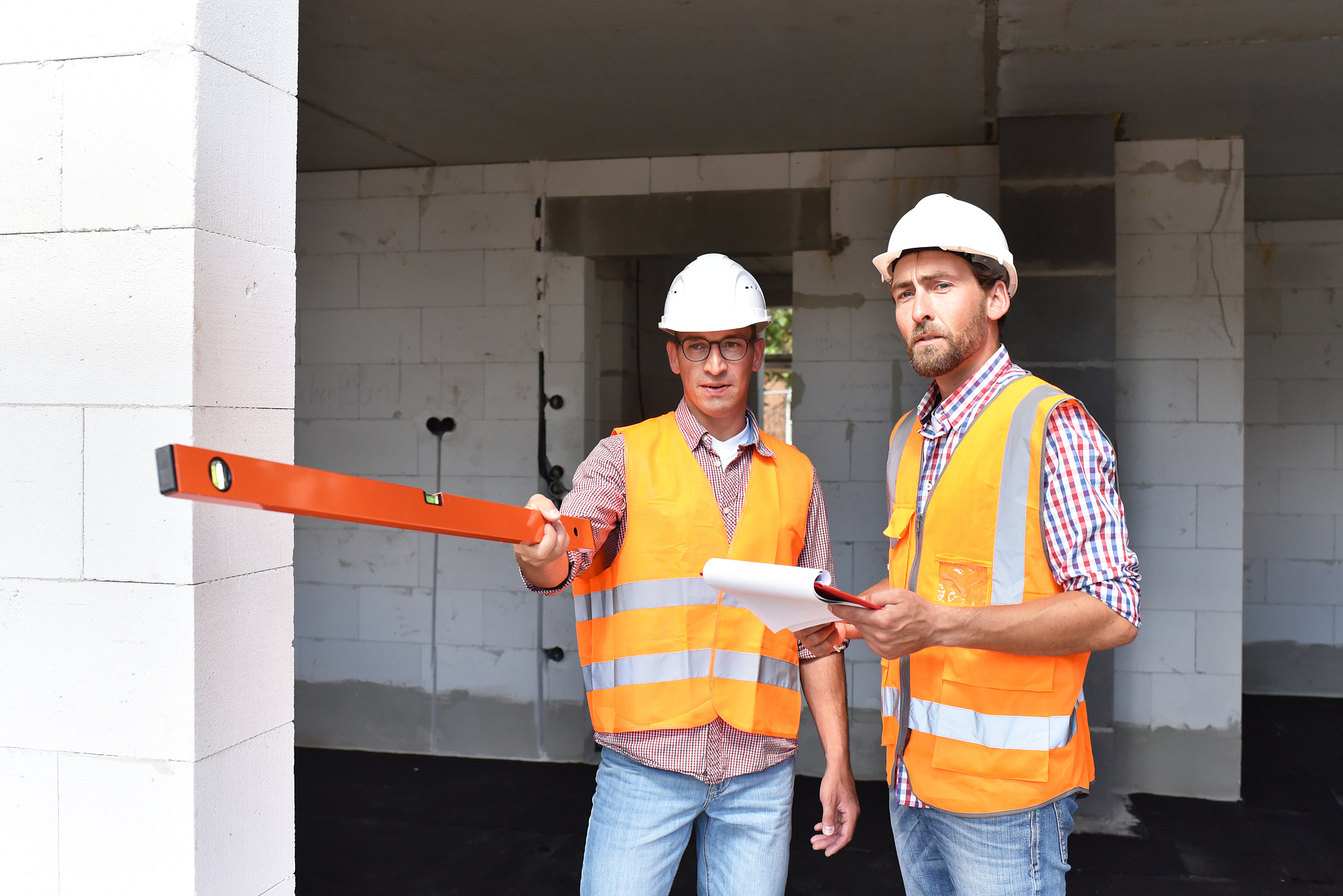 construction manager and architect on site during the constructi