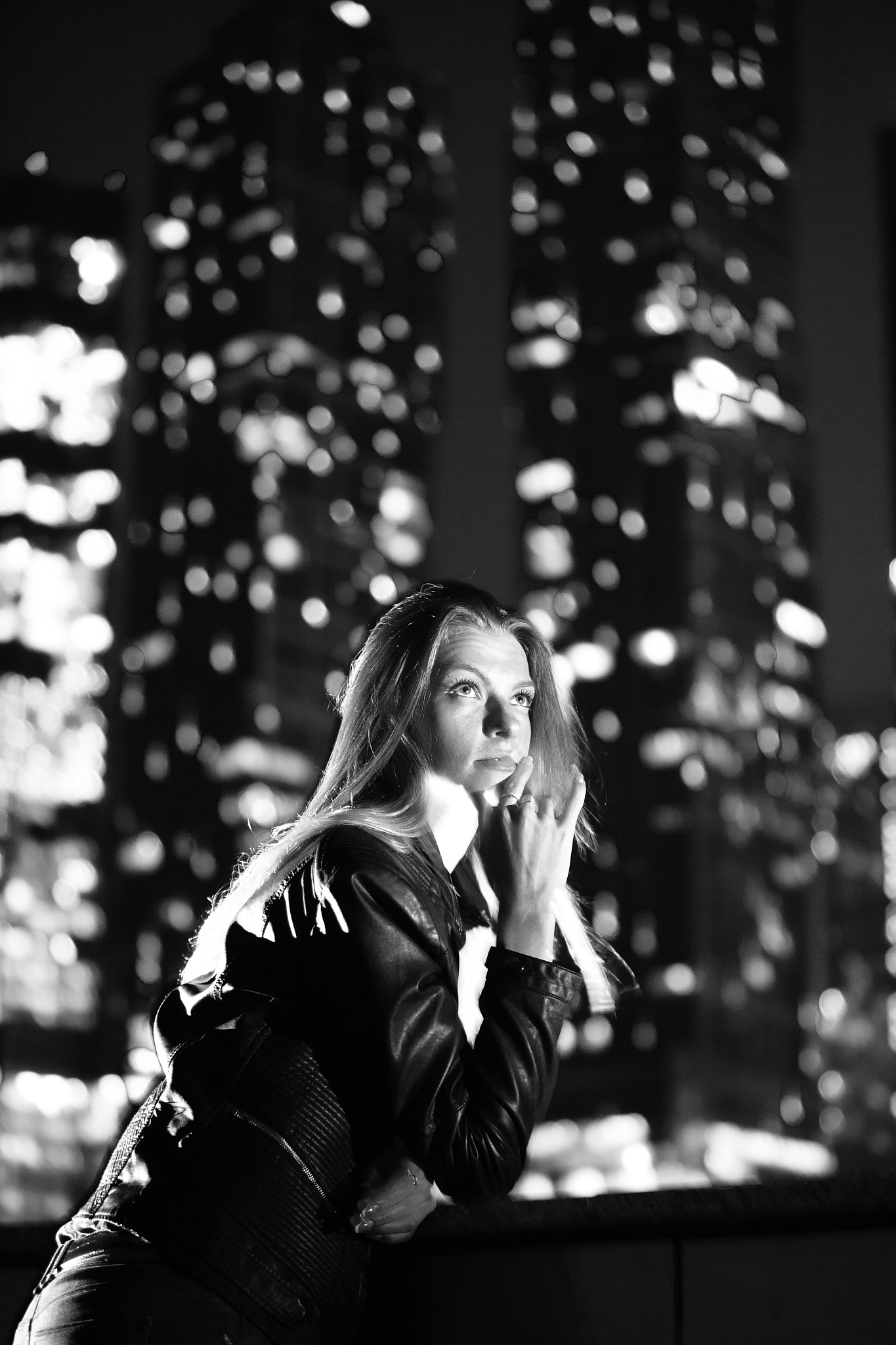 young women in big city's downtown at night. moscow, russia.