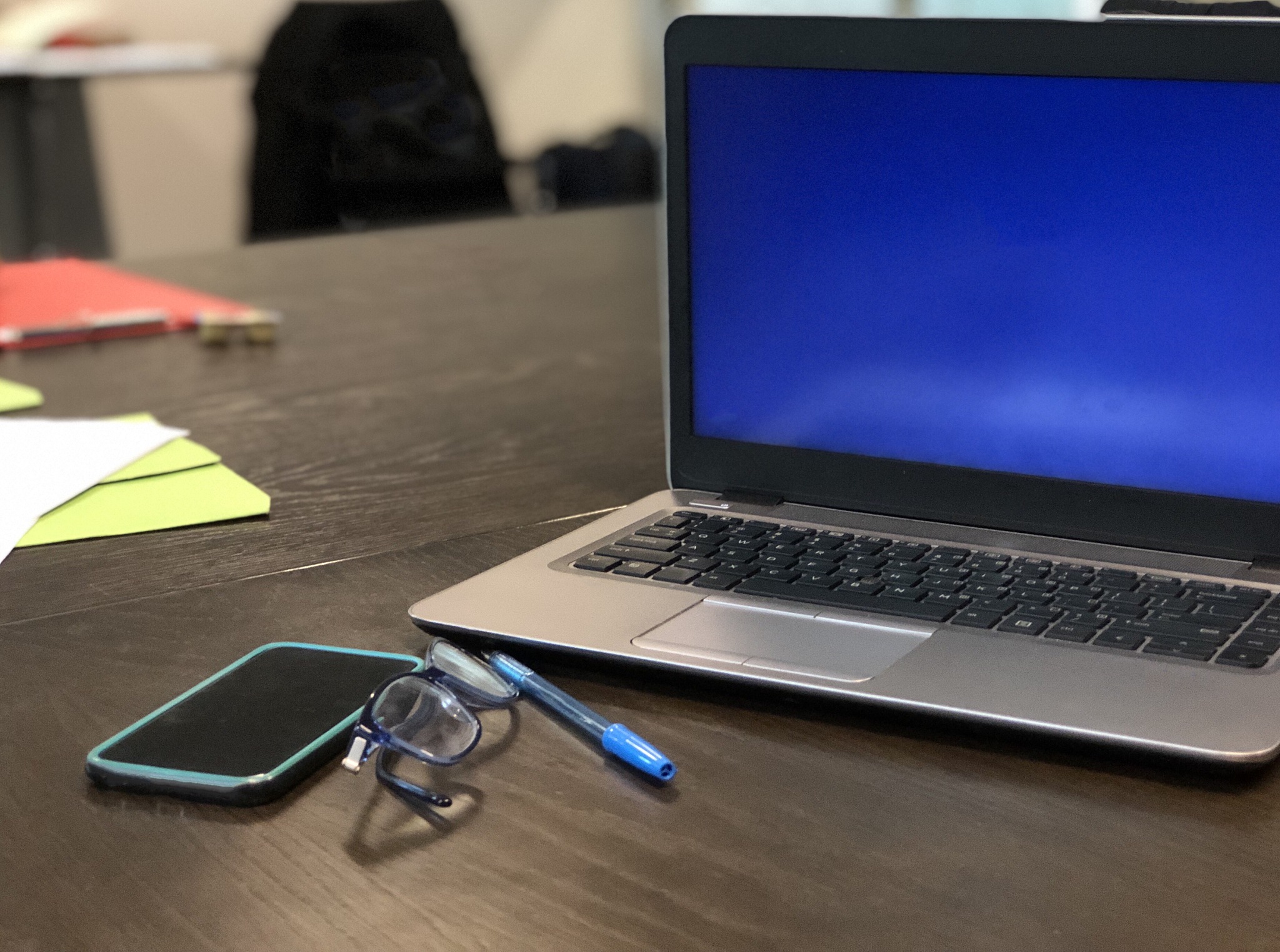 laptop at a work desk