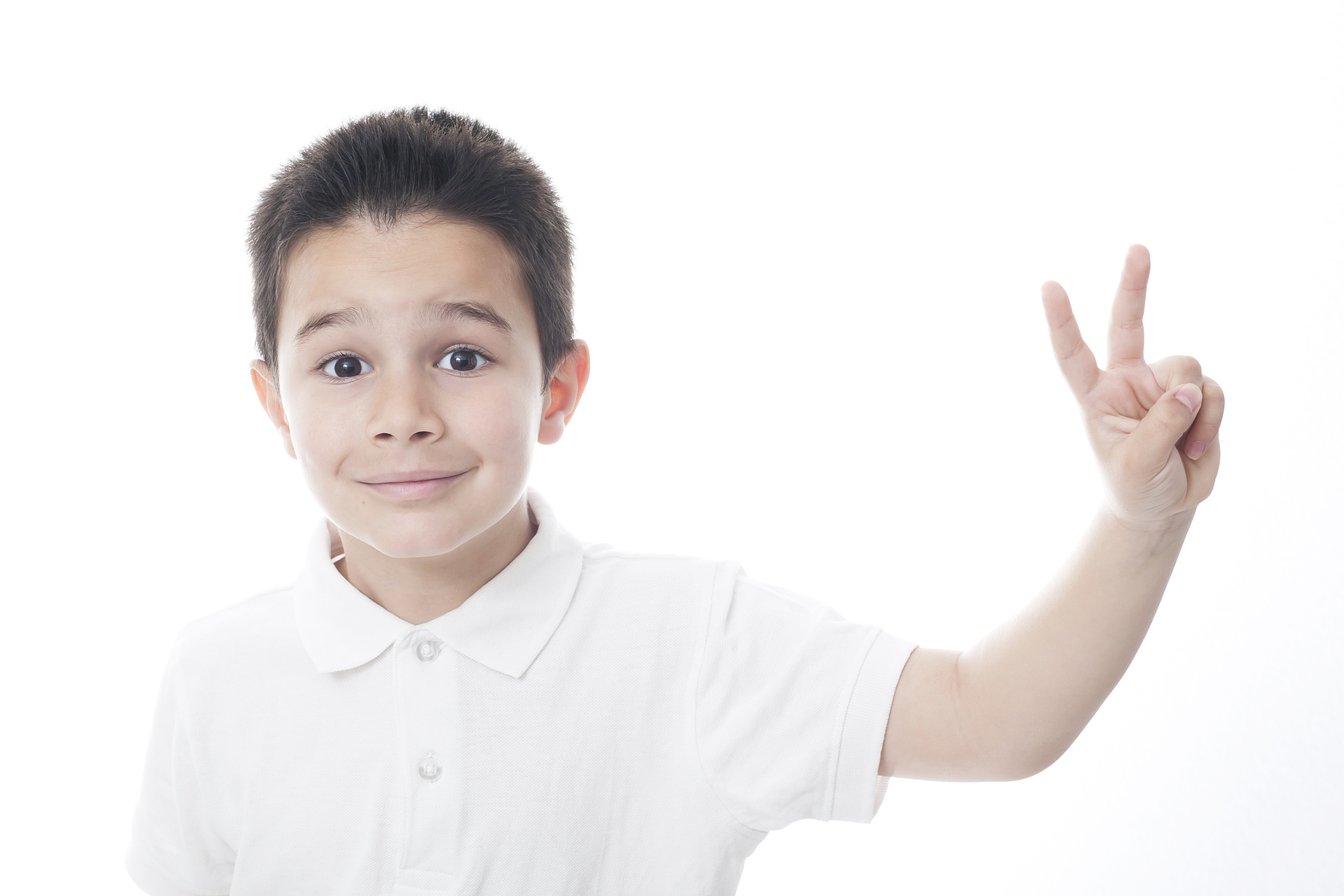 child showing peace sign.