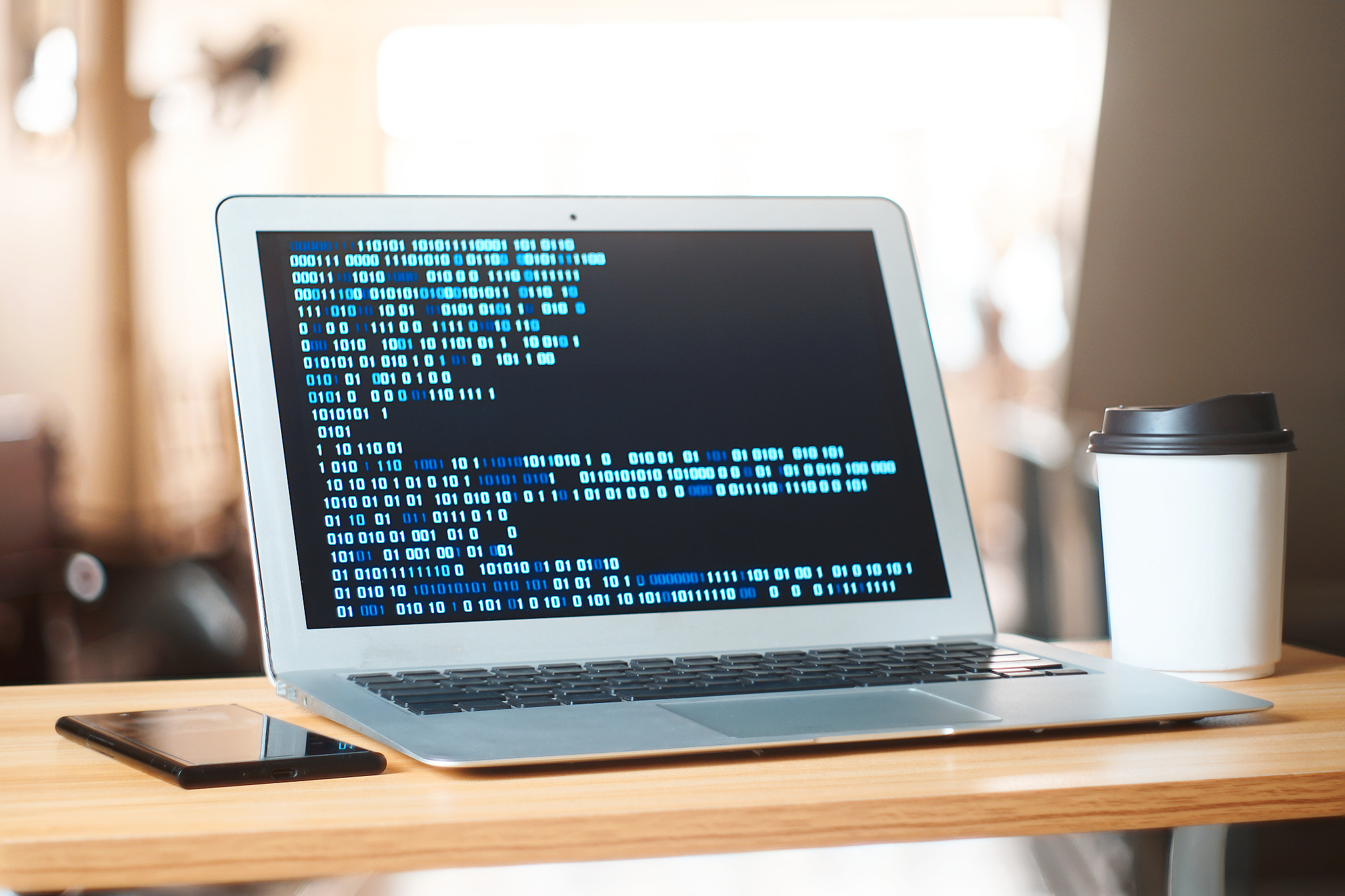 computer laptop and smartphone and coffee cup on working table t