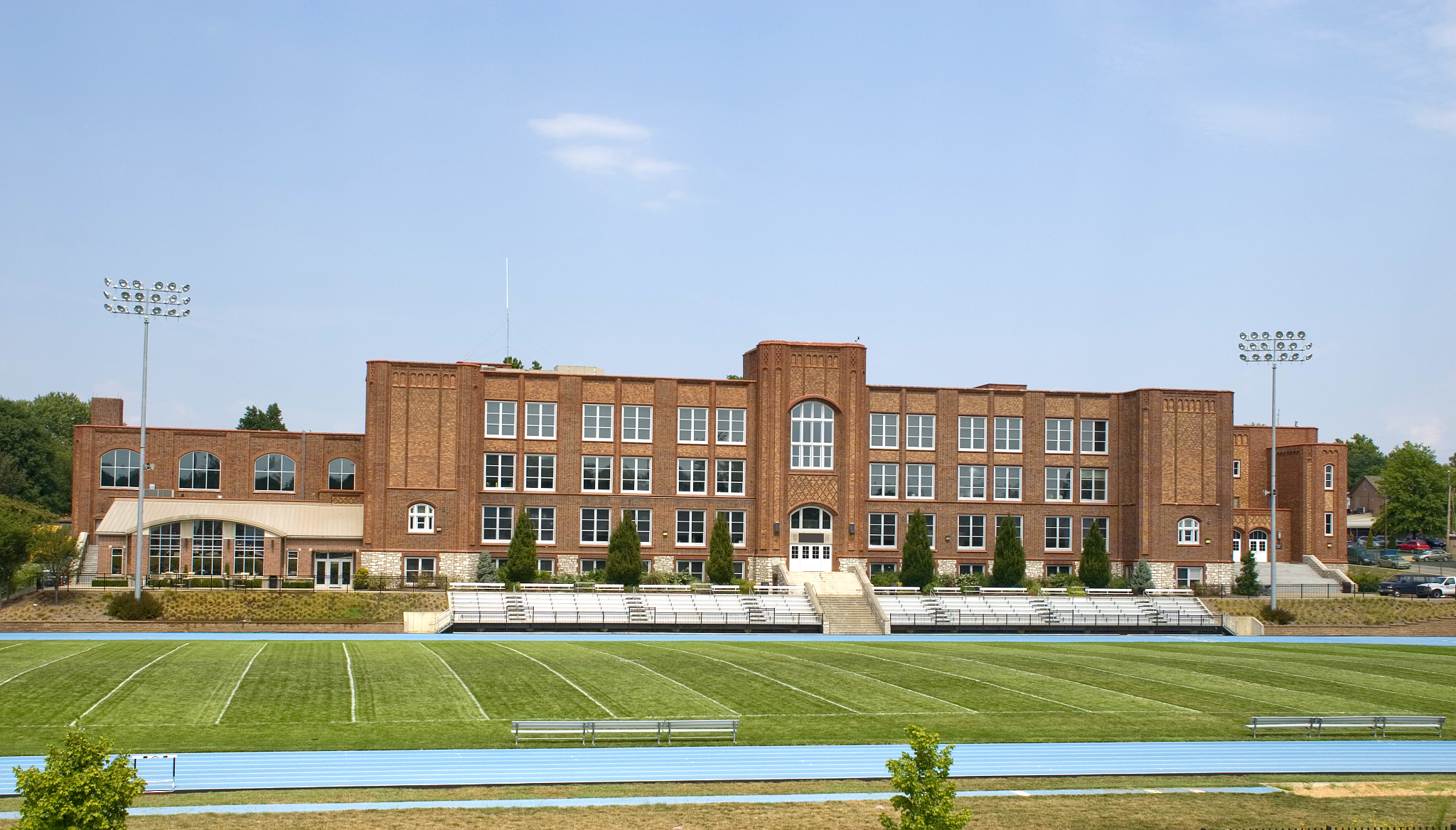 以房产中介的语气自然地用英文翻译这段话：很多客户买学区房就是为了小孩读书方便他们自己不住的